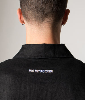 Linen Box Dress Shirt. Shot by EQVVS. Model detailed angled shot.
