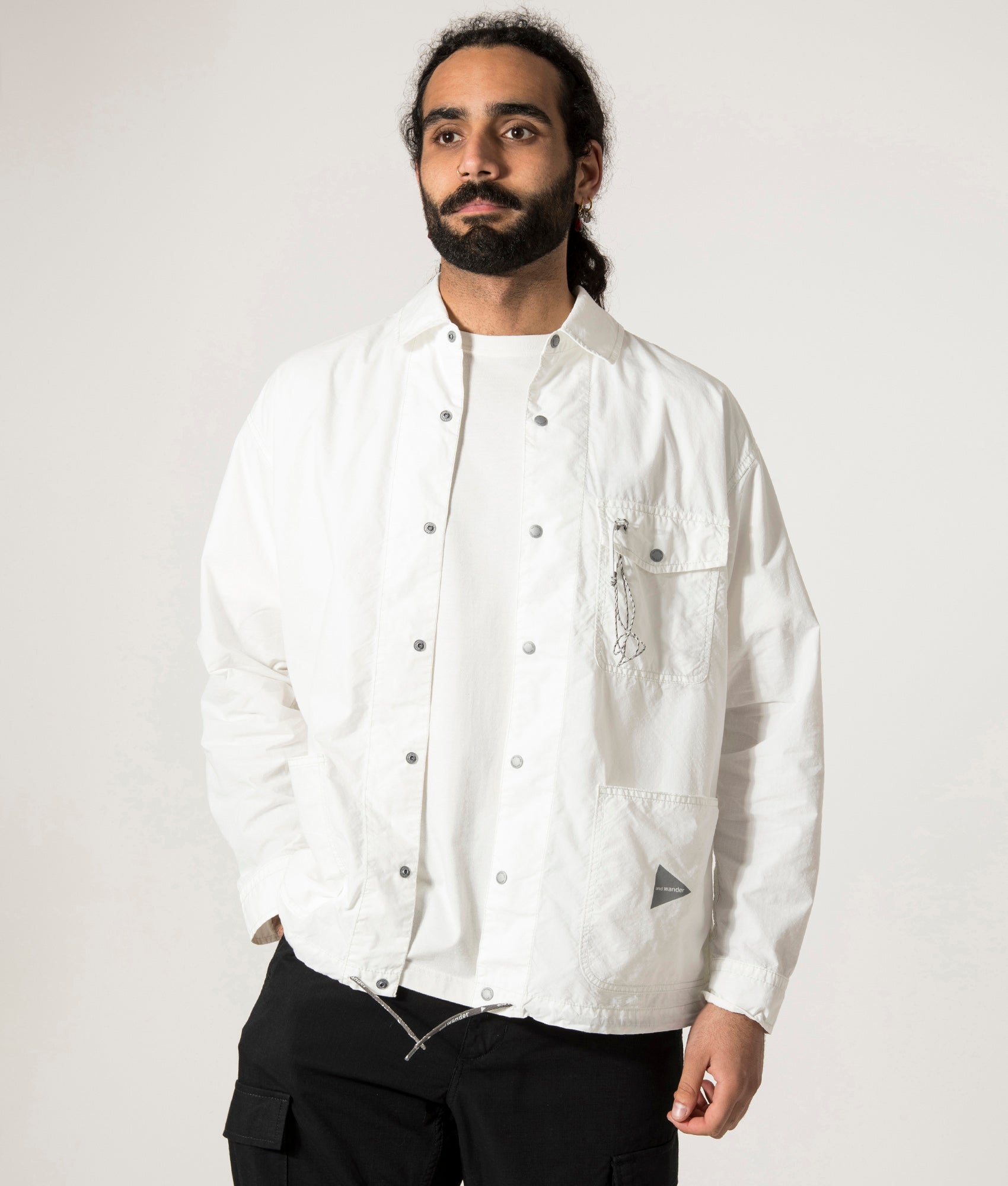 and Wander Cordura Cotton Rip Shirt Jacket in White. Shot at EQVVS. Front Model Shot.