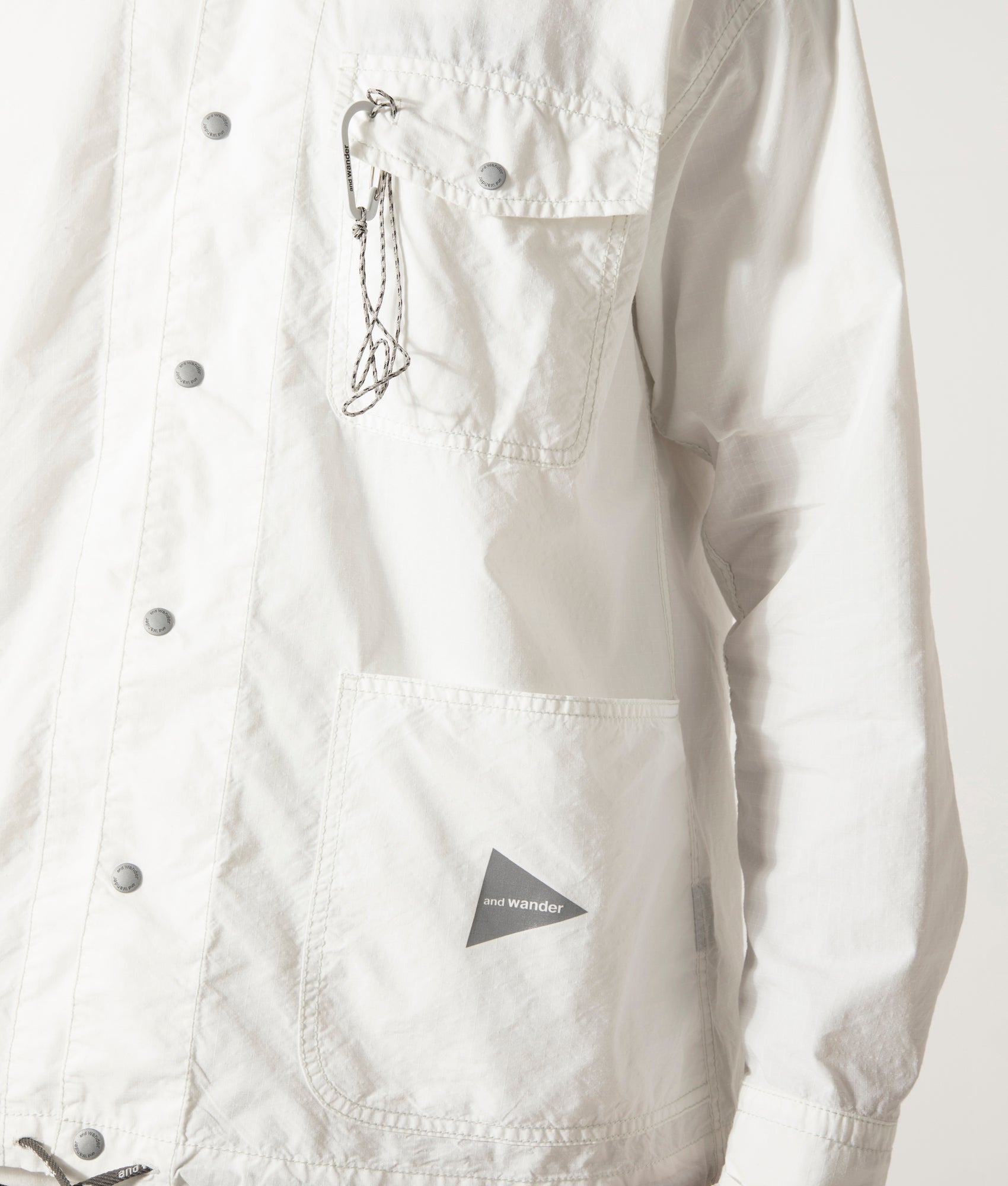 and Wander Cordura Cotton Rip Shirt Jacket in White. Shot at EQVVS. Detail Model Shot.