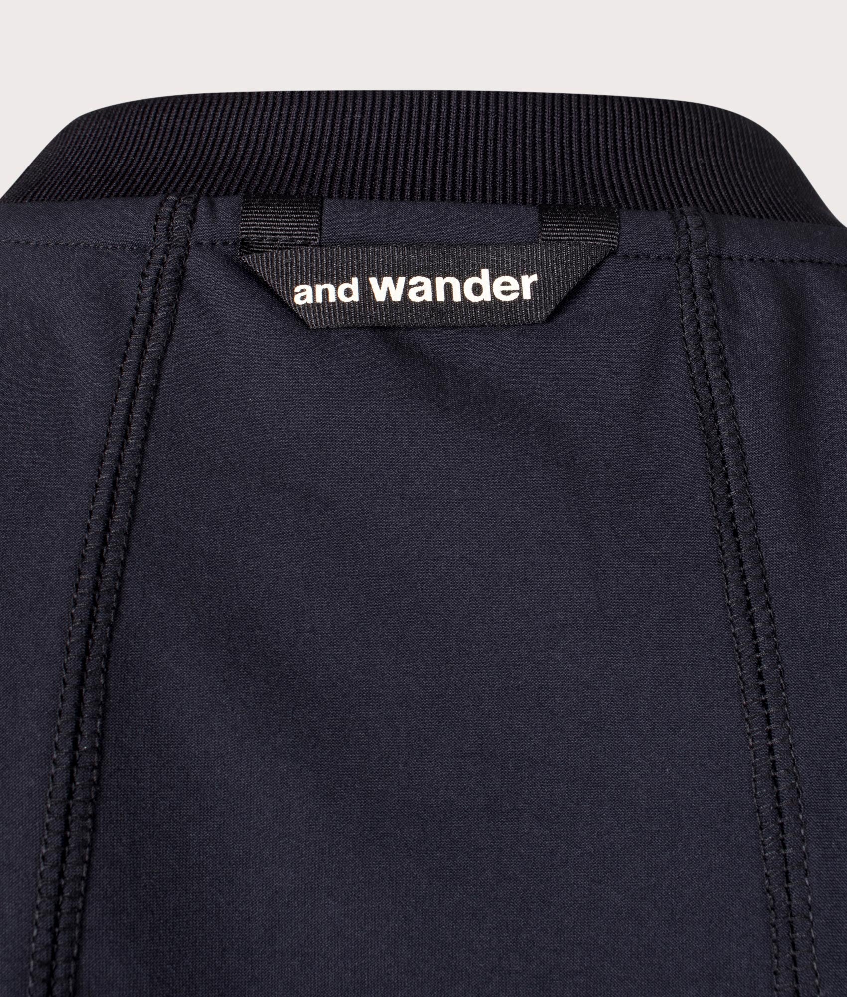 and wander Rash Guard Long Sleeve T-Shirt in Black at EQVVS. Back Detail Shot.