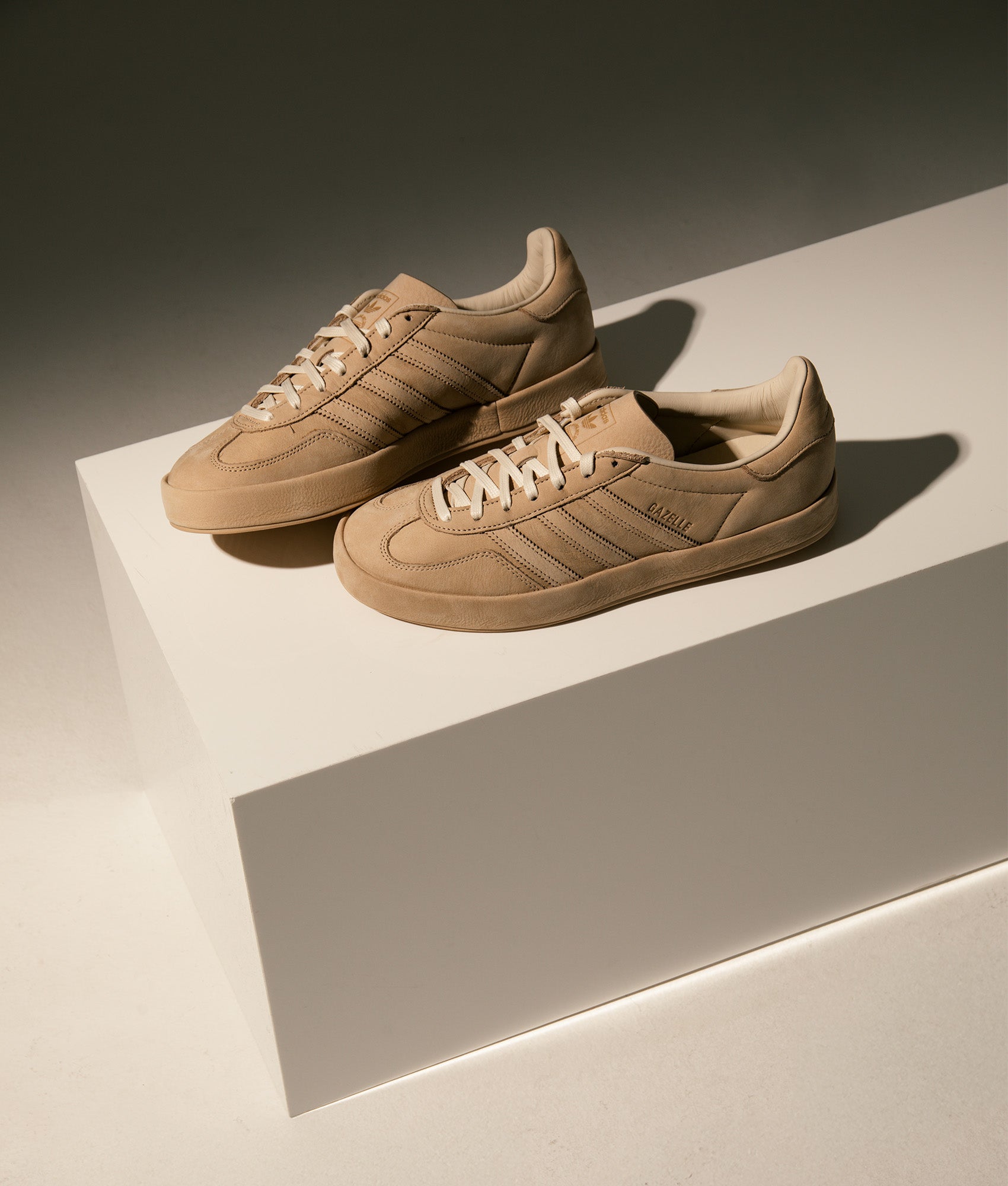 Gazelle Indoor Trainers by adidas in Magic Beige. Shot by EQVVS. Campaign shot.