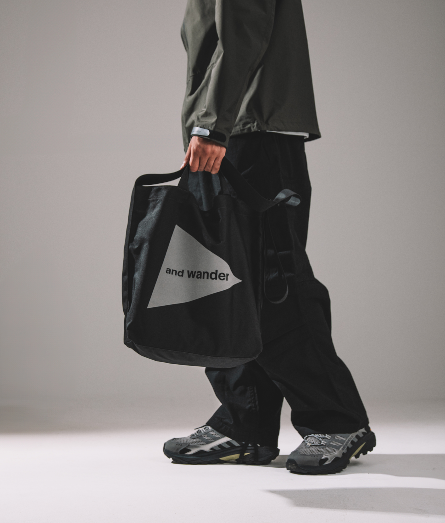 and wander Recycle Ox Tote Bag in black. EQVVS campaign shot
