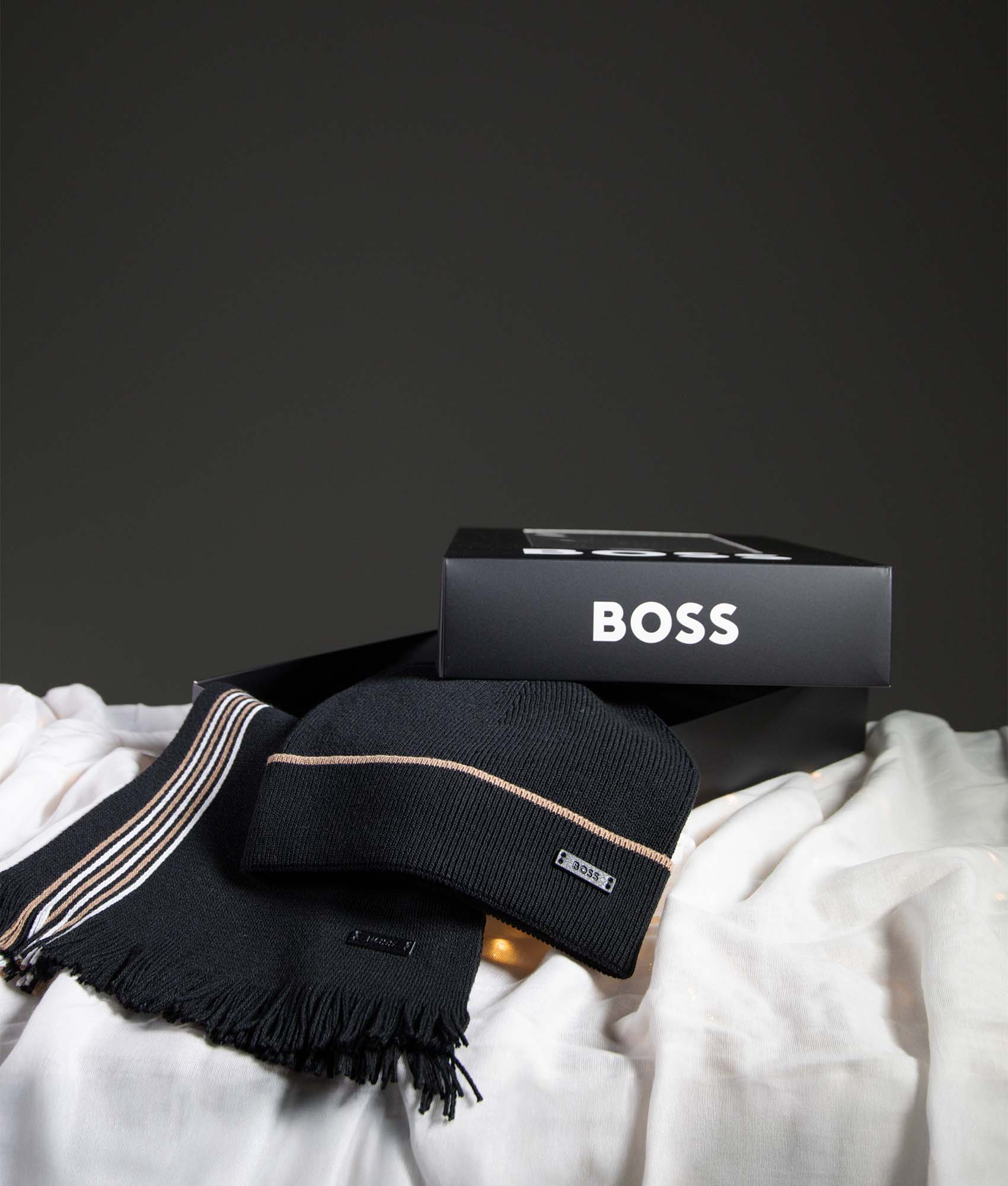 BOSS Enzo Beanie & Scarf Gift Set in Black with Beige and White banding. EQVVS campaign Shot.