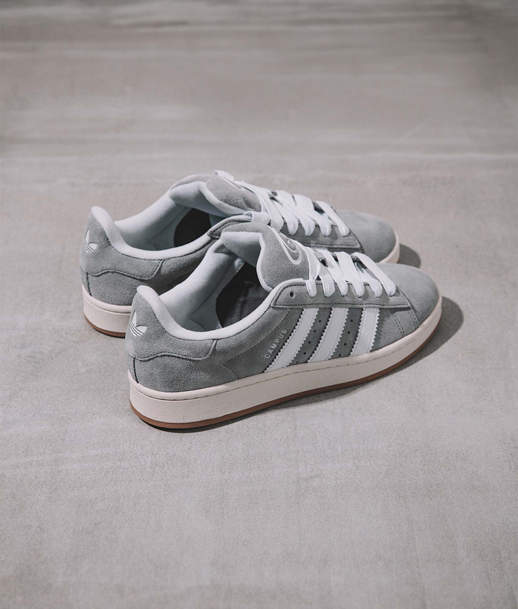 adidas Originals Campus 00s trainer in Grey Three/Footwear White/Off White at EQVVS. campaign shot. 