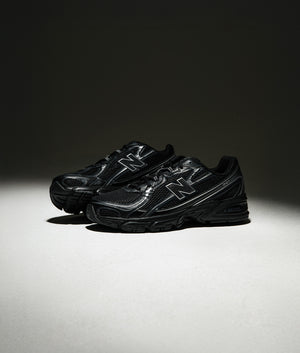 Black New Balance 740 Sneakers. Shot at EQVVS. 