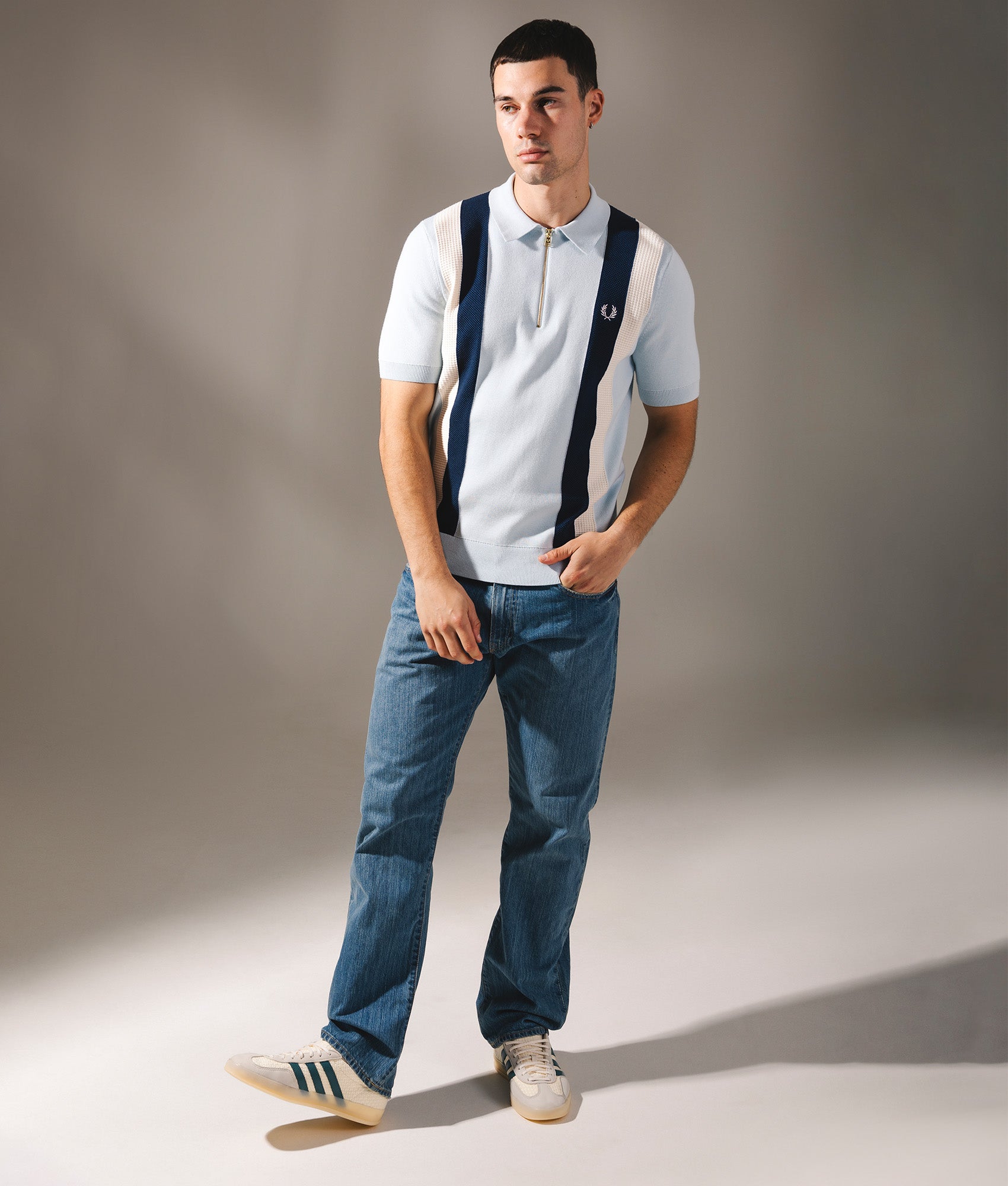 Textured Zip Neck Knitted Polo Shirt by Fred Perry in Light Ice. Shot by EQVVS. Campaign shot.