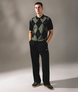 Argyle Knitted Polo Shirt by Fred Perry in Black. Shot by EQVVS. Campaign shot.