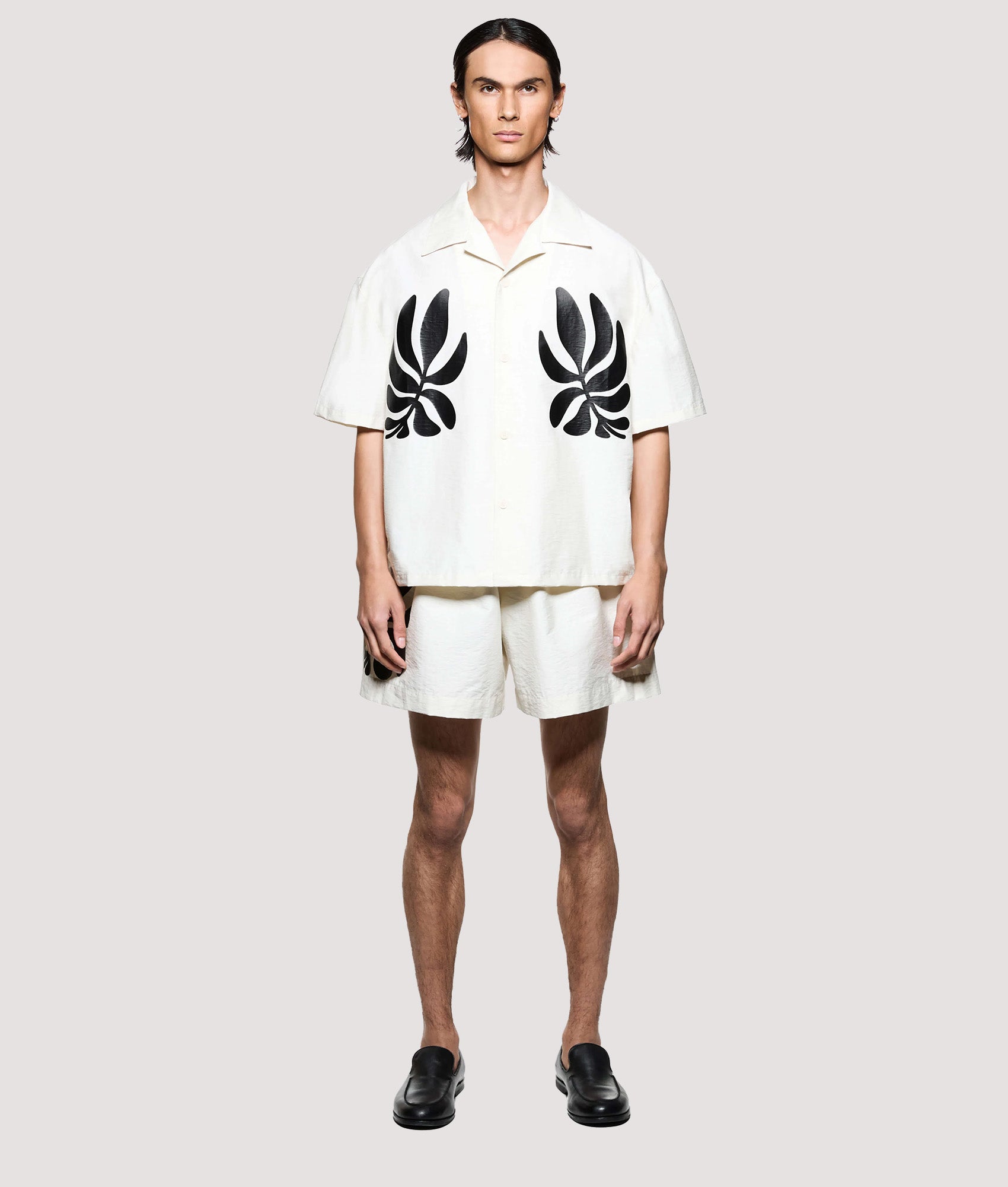 MKI MIYUKI ZOKU Box Fit Botanical Print Short Sleeve Vacation Shirt in Bone. Model front shot.