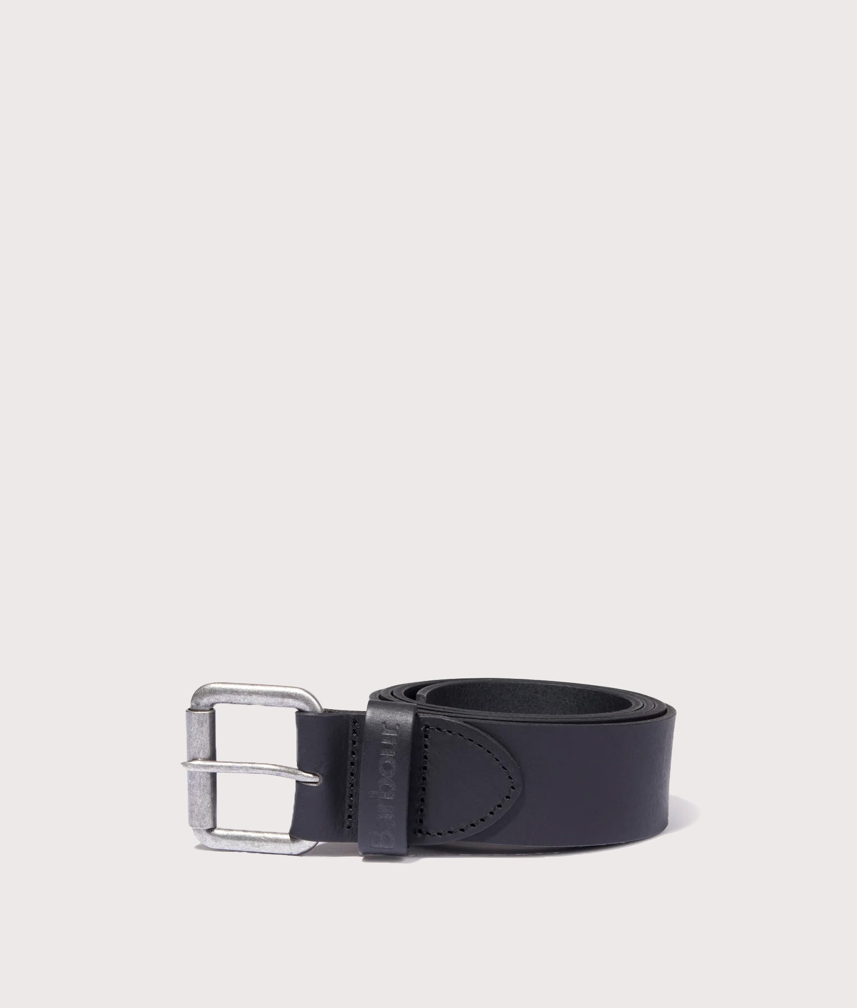 Barbour Lifestyle Allanton Matt Leather Belt in Black at EQVVS Menswear. Rolled up shot.