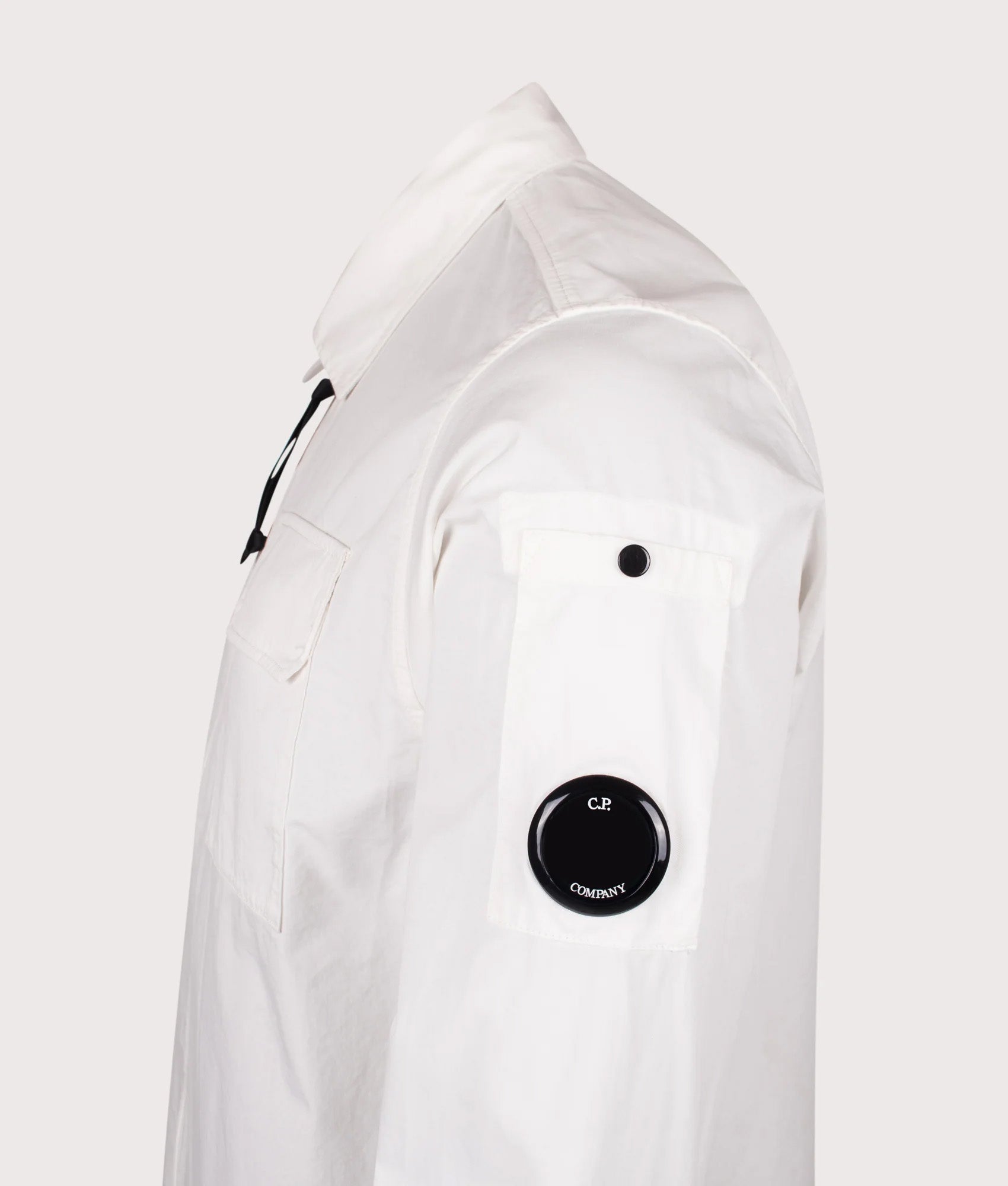 Organic Gabardine Zipped Lens Overshirt in Hauze White | 100% Organic Cotton | C.P. Company | EQVVS | Side detail shot 