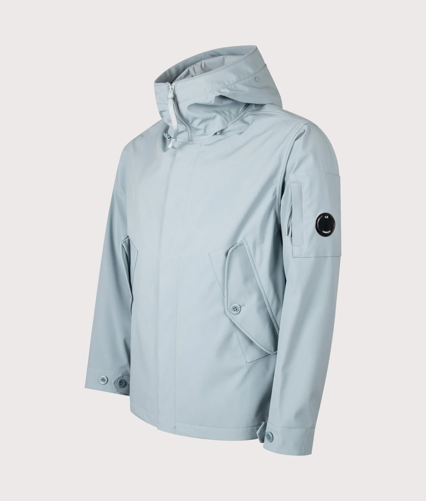C.P. Company Shell-R Goggle Jacket in Silver Blue at EQVVS Menswear. Angled front shot.