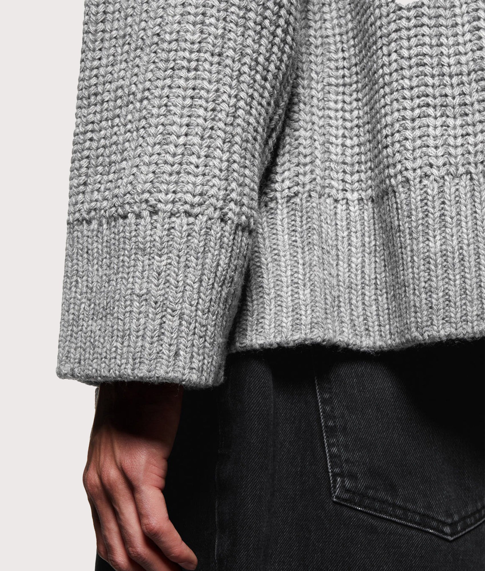 MKI MIYUKI ZOKU Oversized Chunky Ribbed Knit Hoodie in Grey Melange at EQVVS Menswear. Hem and cuff detail shot.