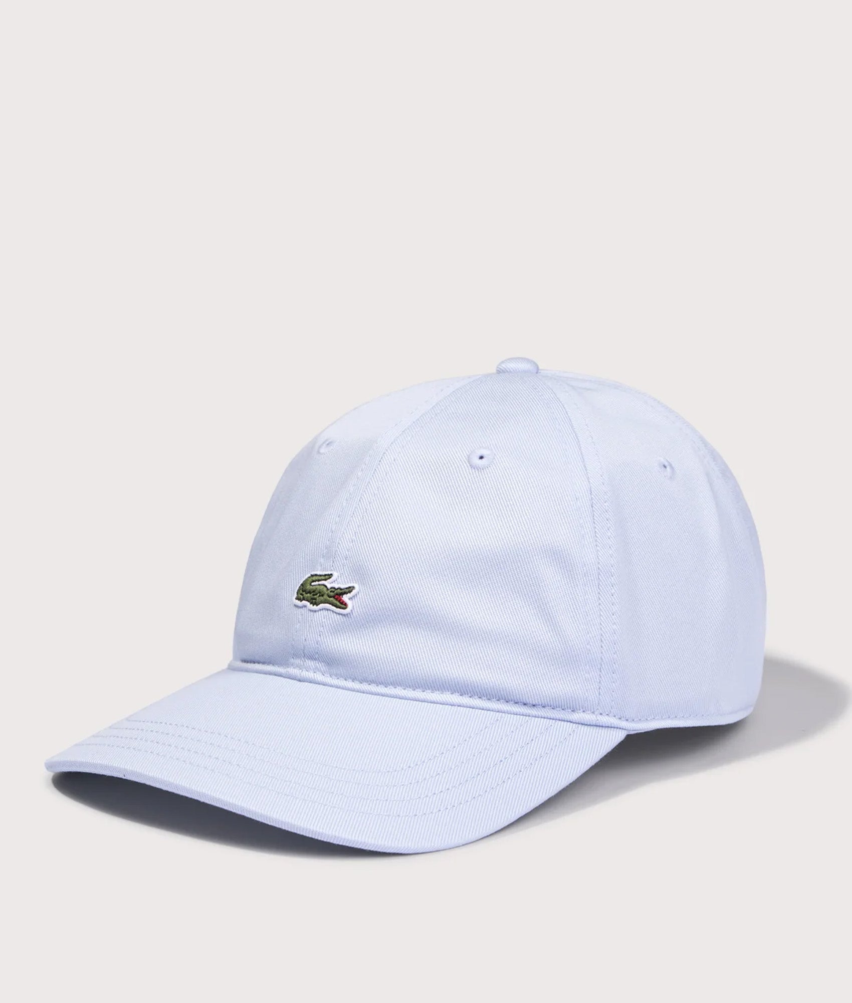 Lacoste Logo cap in Phoenix Blue at EQVVS Menswear. Angled front shot.