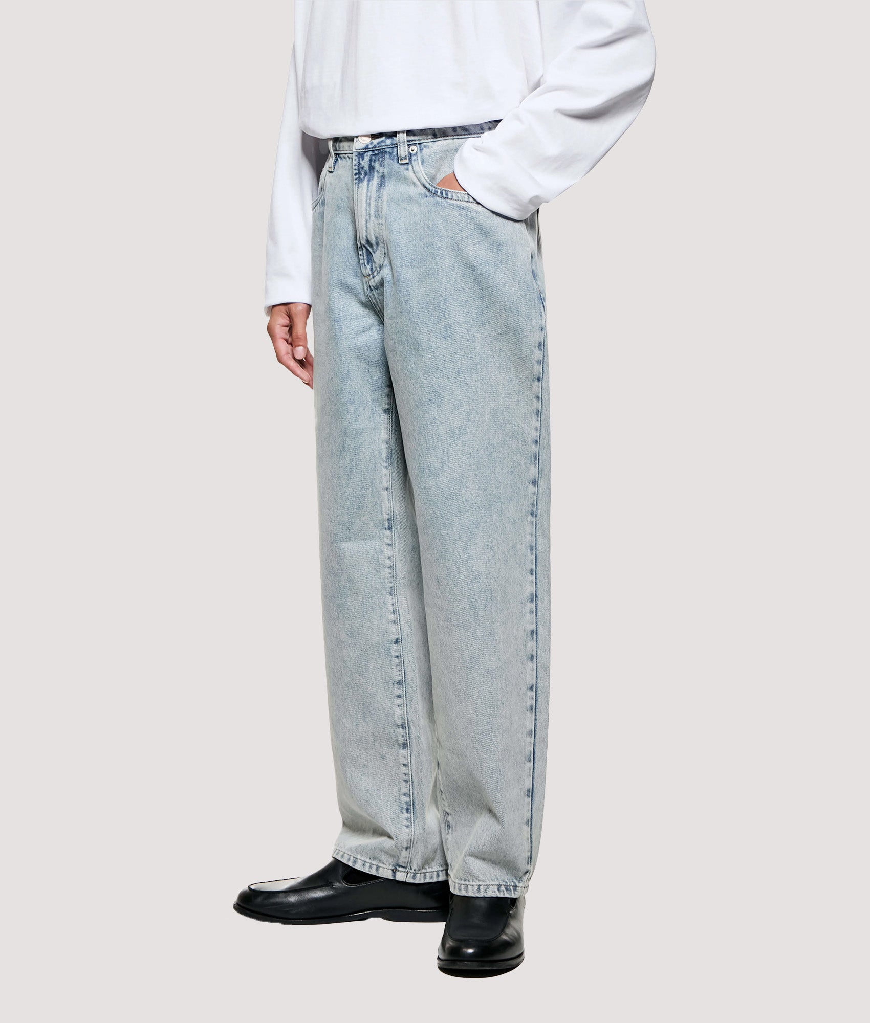 MKI MIYUKI ZOKU Denim Classic Jeans return in Bleach Wash at EQVVS Menswear. Angled model back shot.