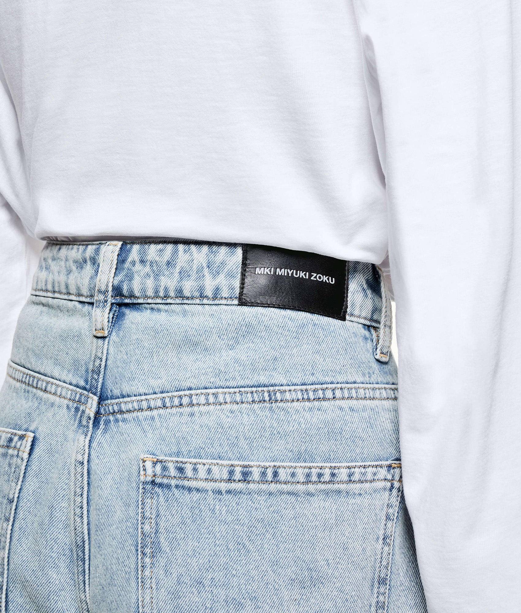 MKI MIYUKI ZOKU Denim Classic Jeans return in Bleach Wash at EQVVS Menswear. Detail shot.