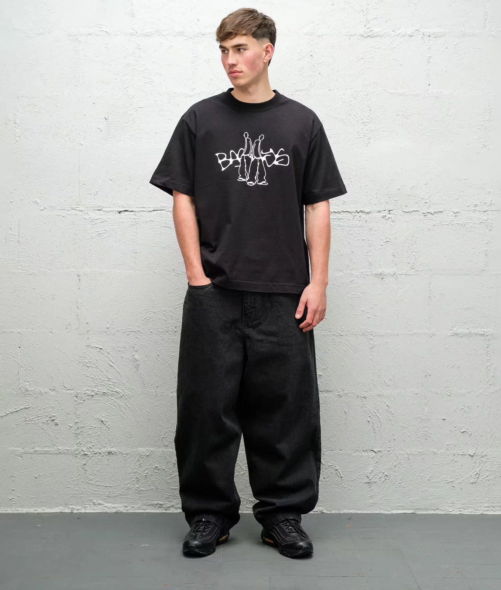 Baggys Baggy Denim Pants in Pitch Black at EQVVS Menswear. Model front shot.