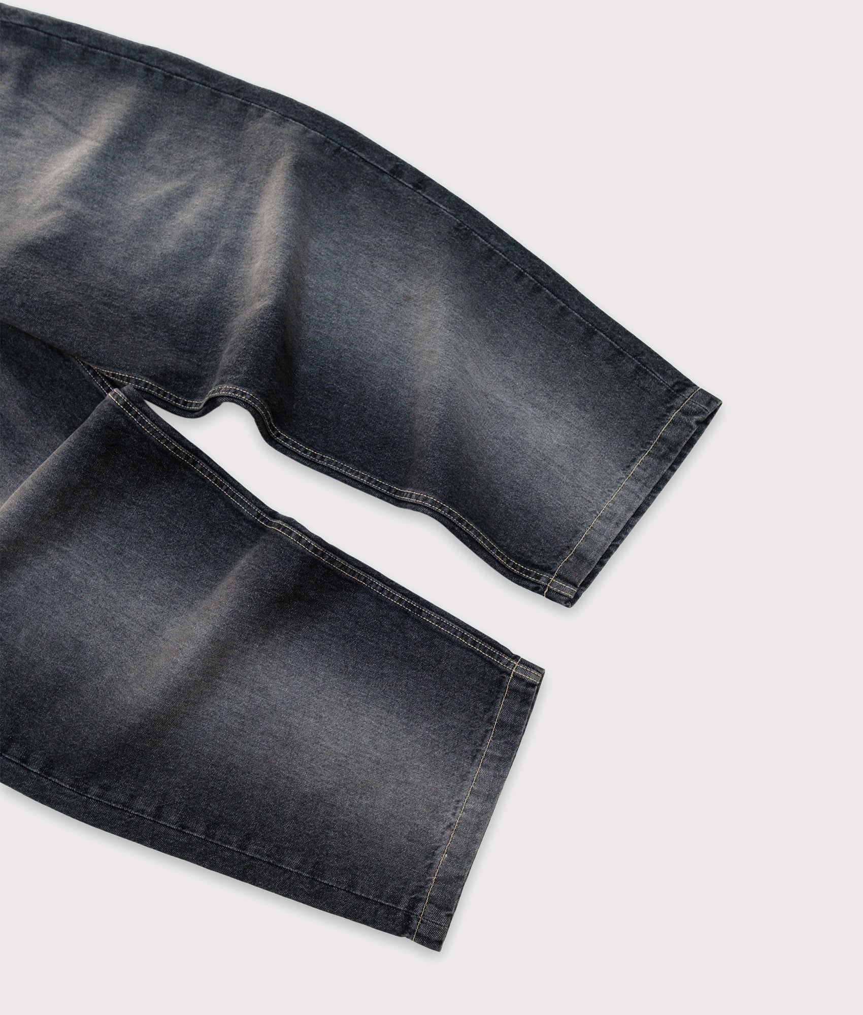 Baggys Baggy Denim Pants in Flint Grey at EQVVS Menswear. Detail shot.
