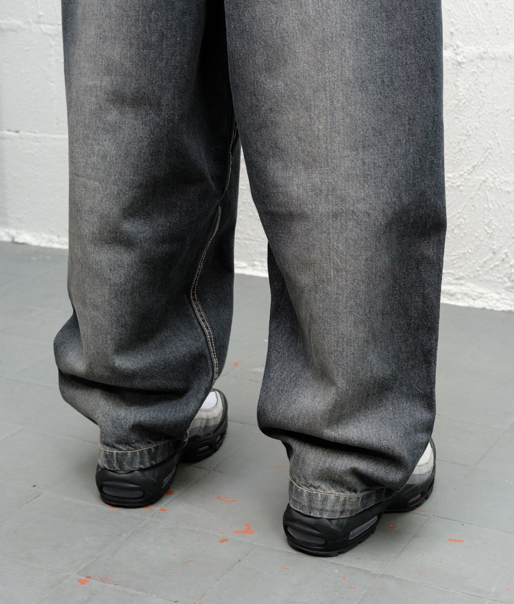 Baggys Baggy Denim Pants in Flint Grey at EQVVS Menswear. Stack shot.