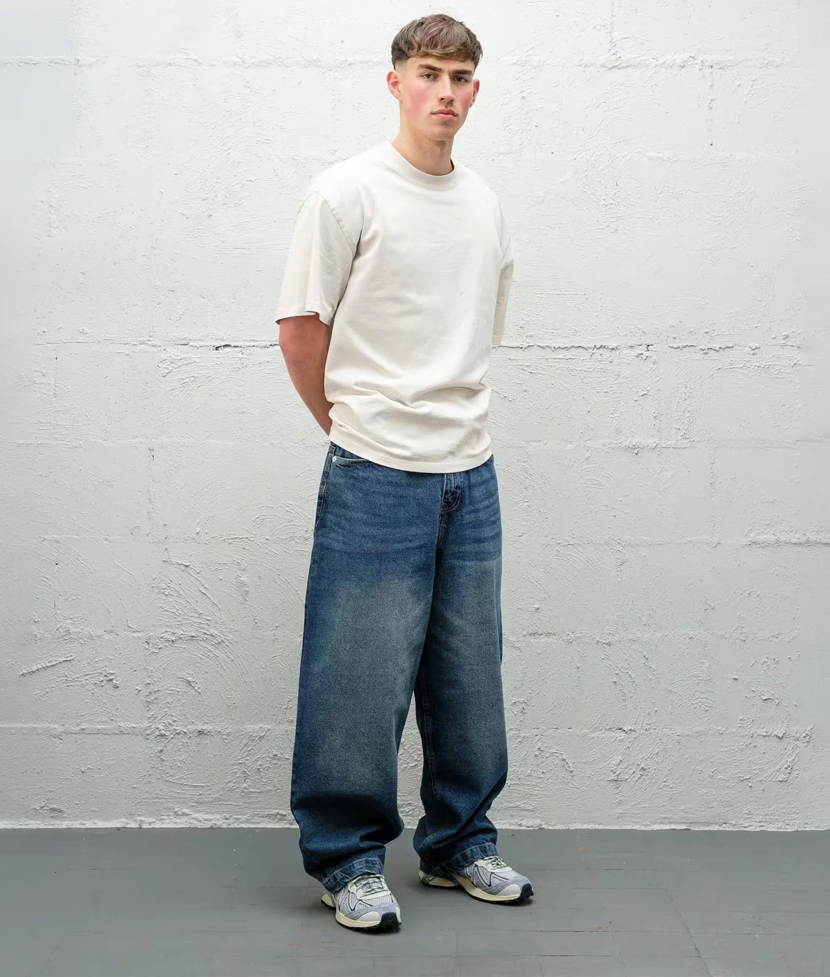 Baggys Baggy Denim Pants season in  Frost at EQVVS Menswear. Model front shot.