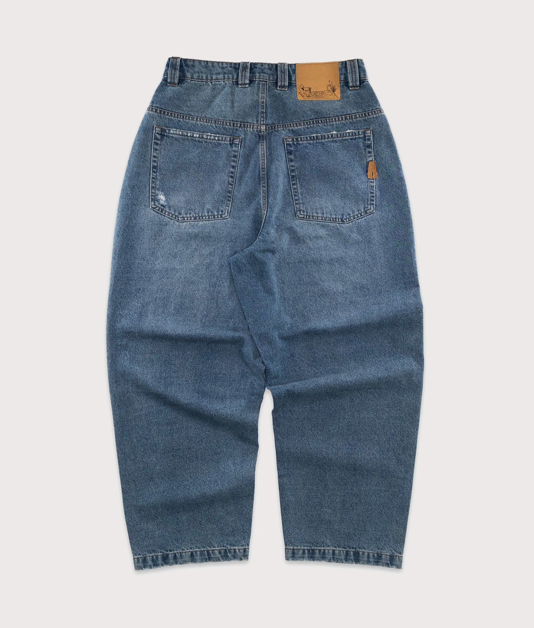 Baggys Baggy Denim Pants in Light Washed Fray at EQVVS Menswear. Back shot.