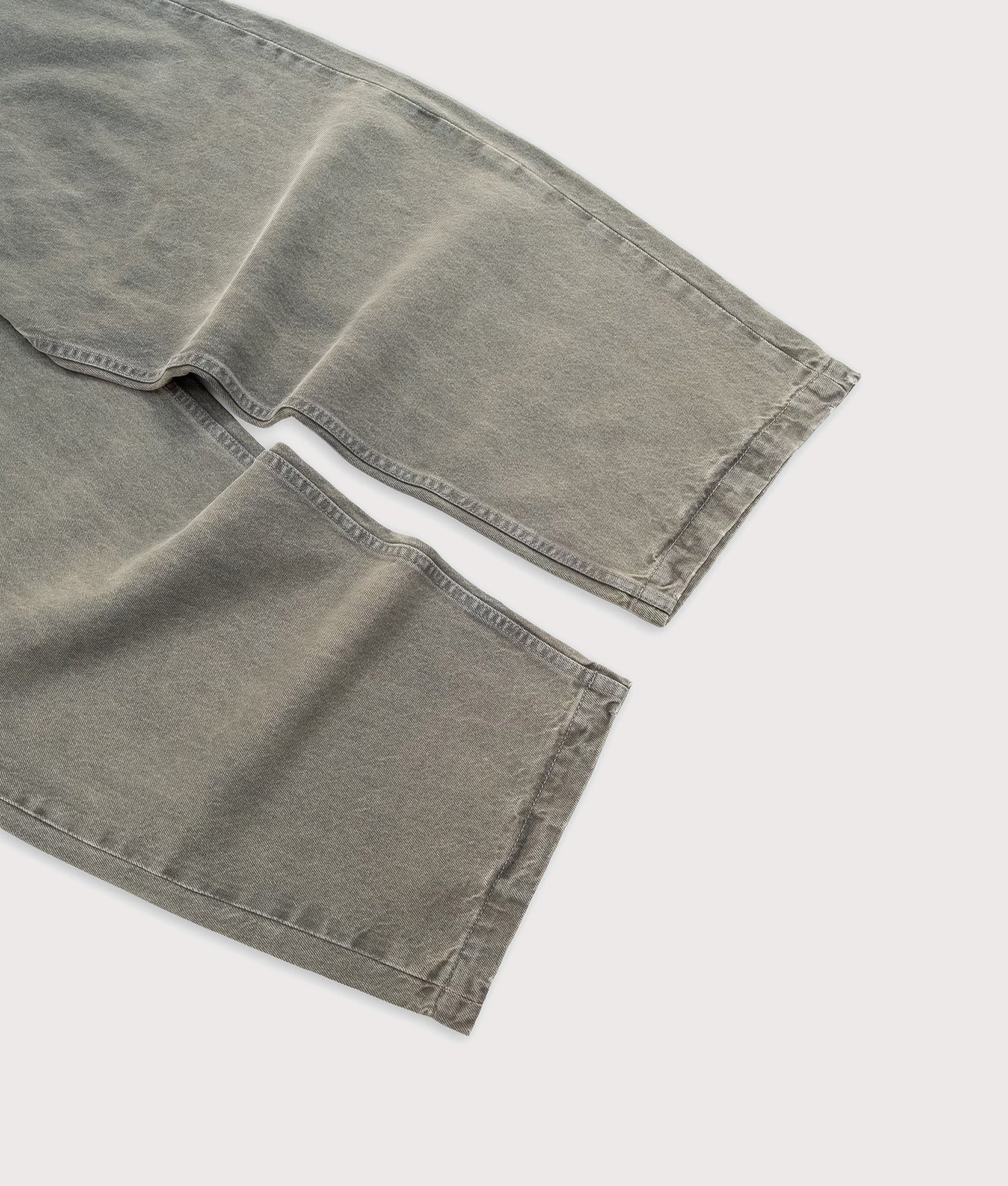 Baggys Baggy Denim Pants in Sage at EQVVS Menswear. Detail shot.
