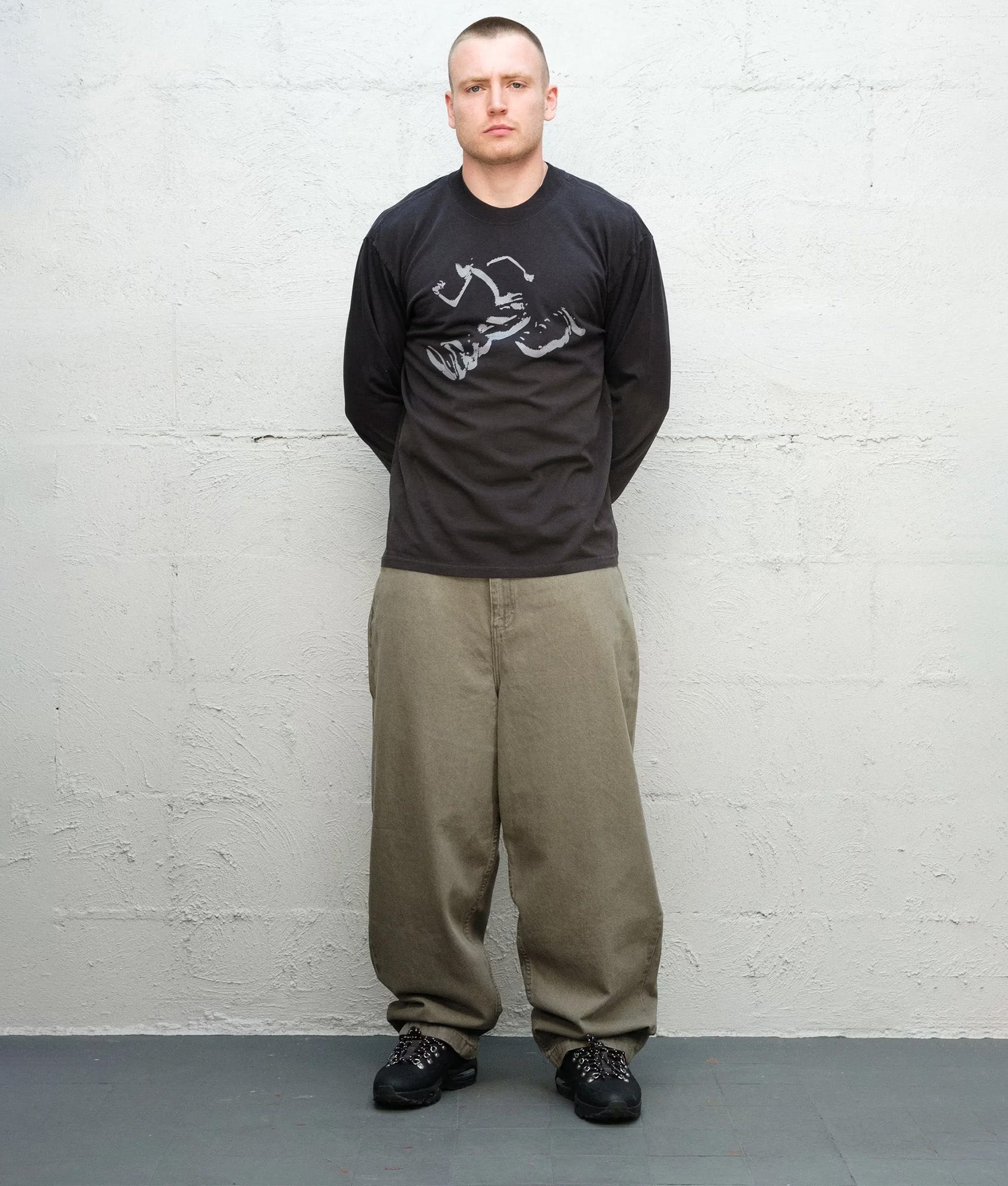 Baggys Baggy Denim Pants in Sage at EQVVS Menswear. Model front shot.