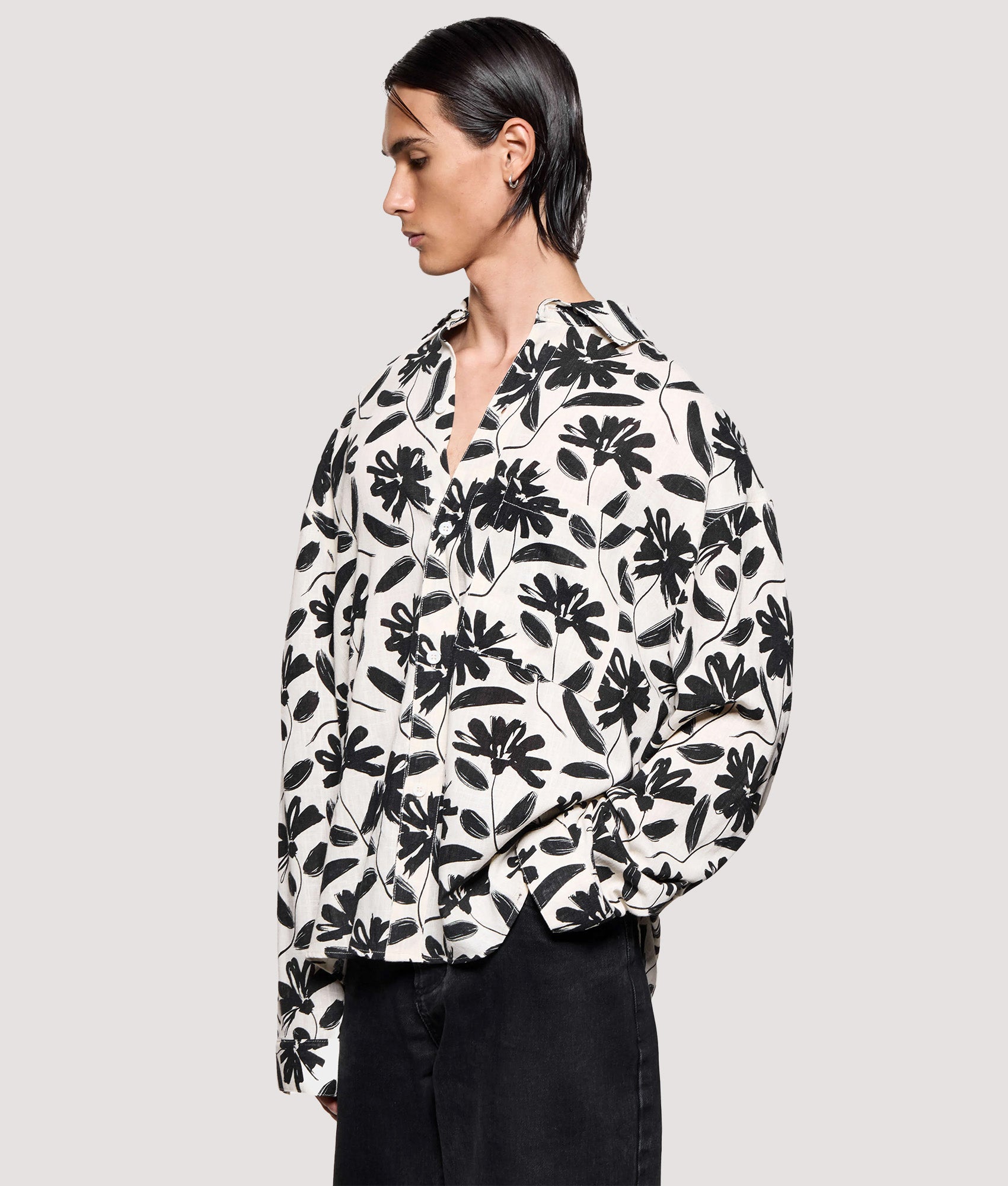 MKI MIYUKI ZOKU Box Fit Floral Linen Dress Shirt in Raw at EQVVS Menswear. Angled model front shot.