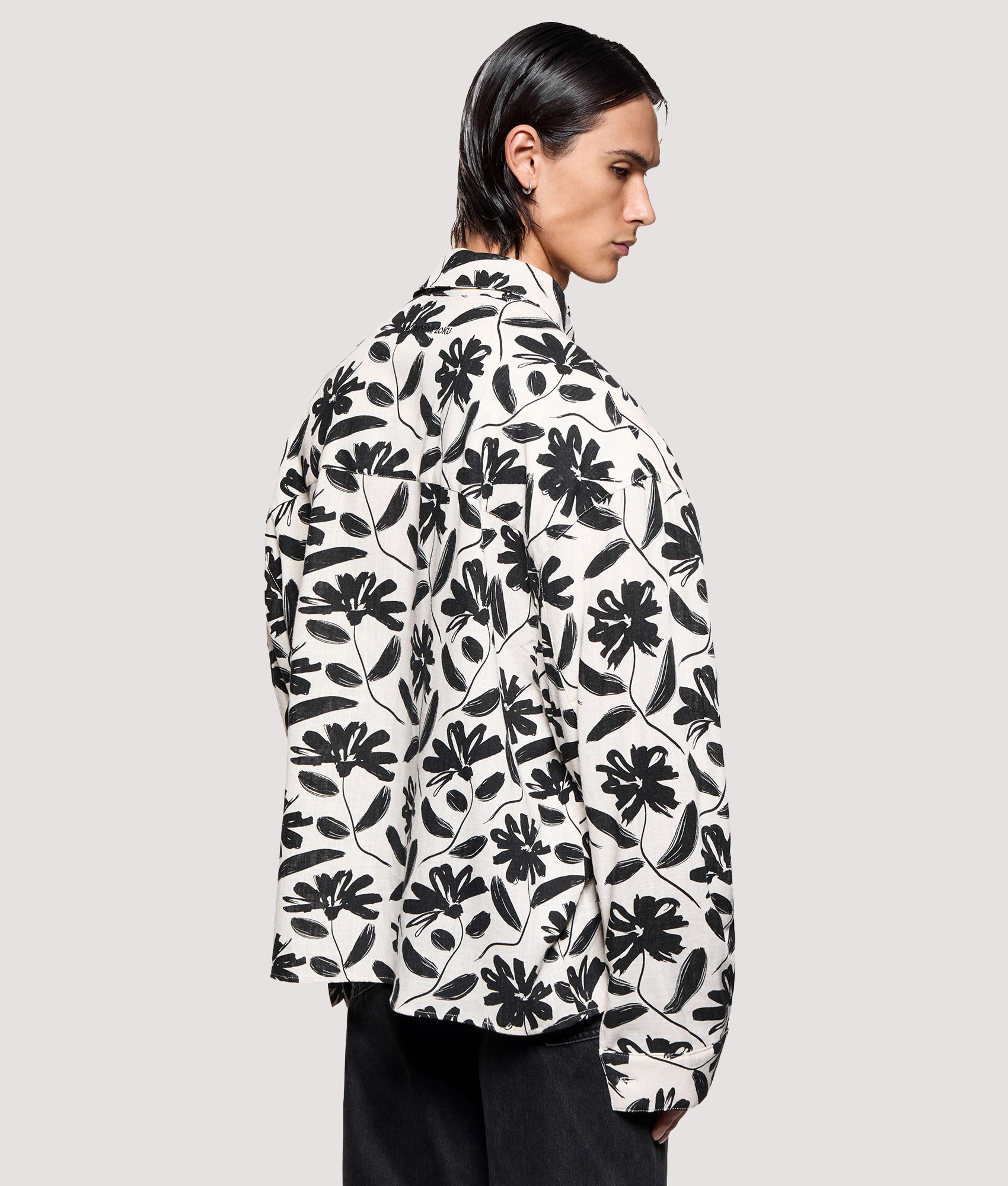 MKI MIYUKI ZOKU Box Fit Floral Linen Dress Shirt in Raw at EQVVS Menswear. Angled model back shot.