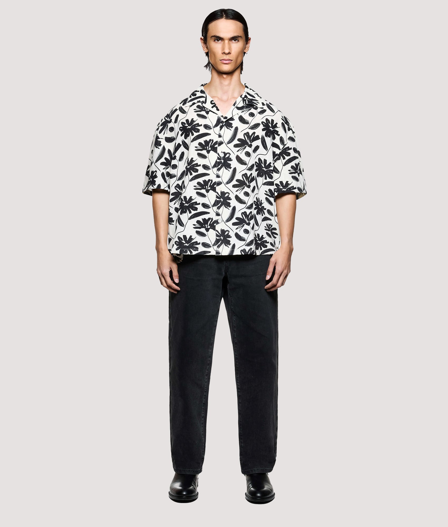 MKI MIYUKI ZOKU Box Fit Floral Linen Short Sleeve Vacation Shirt in Raw at EQVVS Menswear. Model full front shot.