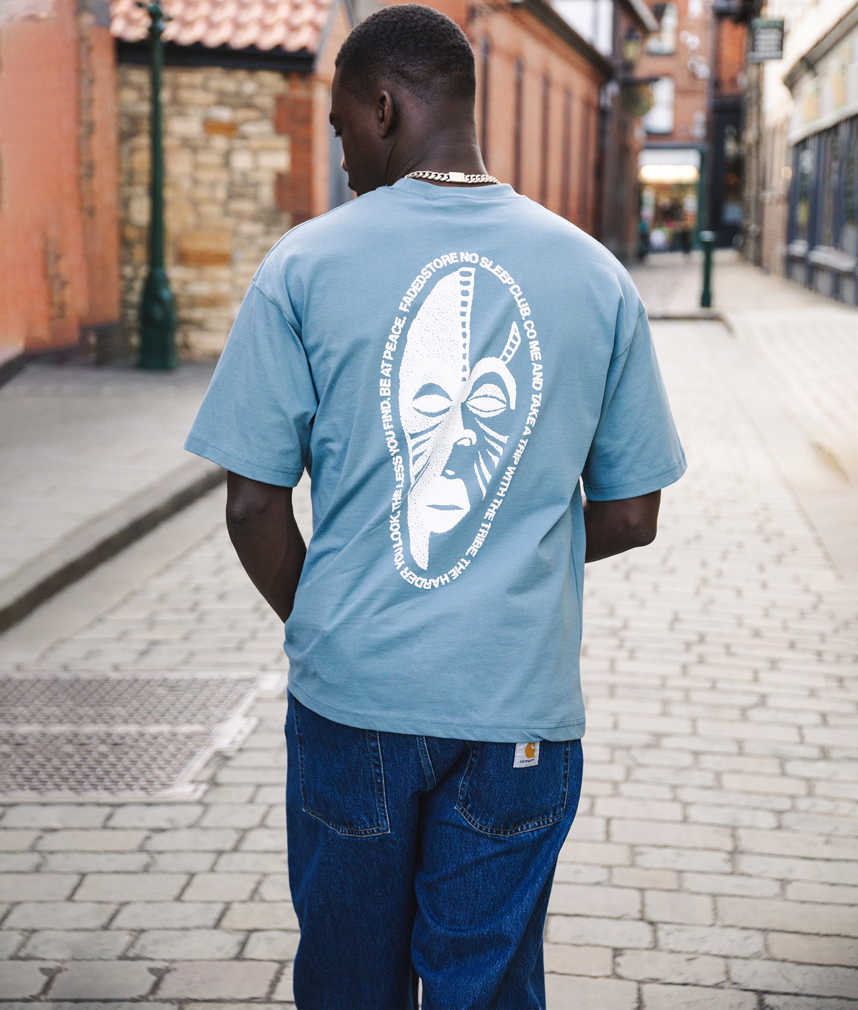 Faded Relaxed Fit NSC Face T-Shirt in Basalt at EQVVS Menswear. Campaign Shot.