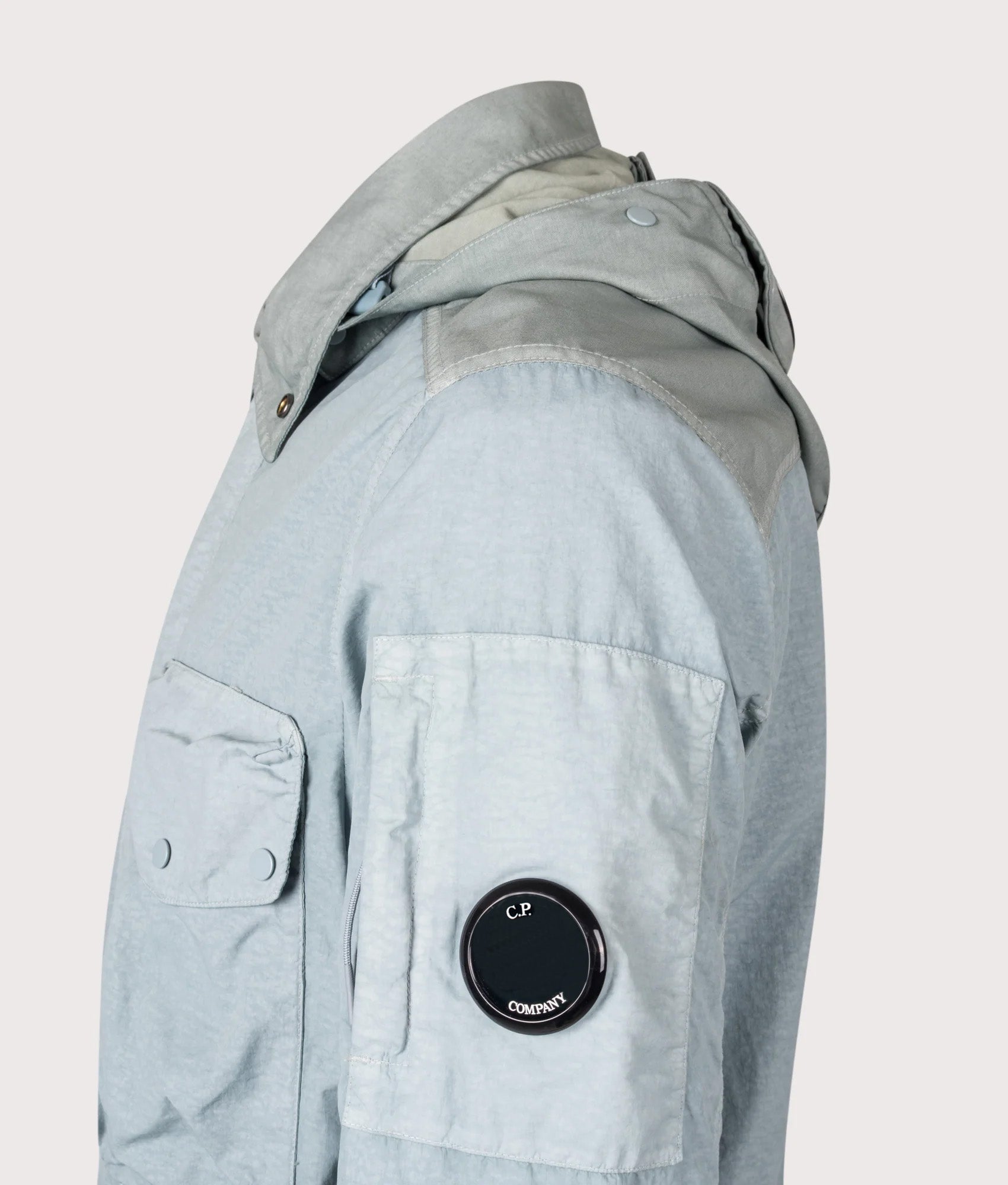 C.P. Company Flatt Nylon Mixed Goggle Overshirt in Silver blue at EQVVS Menswear. Detail shot.