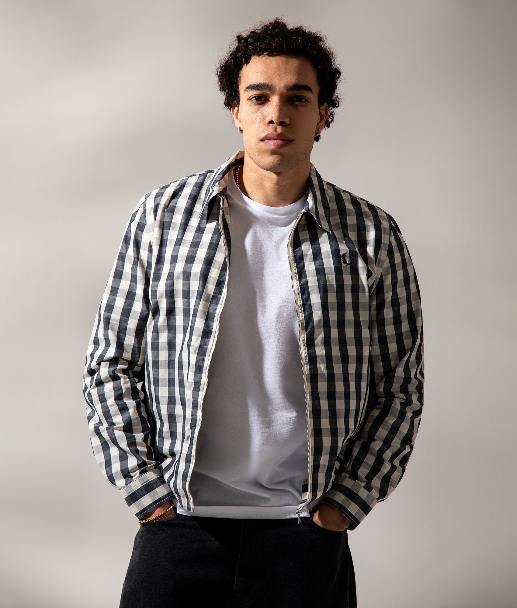 Fred Perry Poplin check Overshirt in Butter Cream at EQVVS Menswear. Campaign Shot.