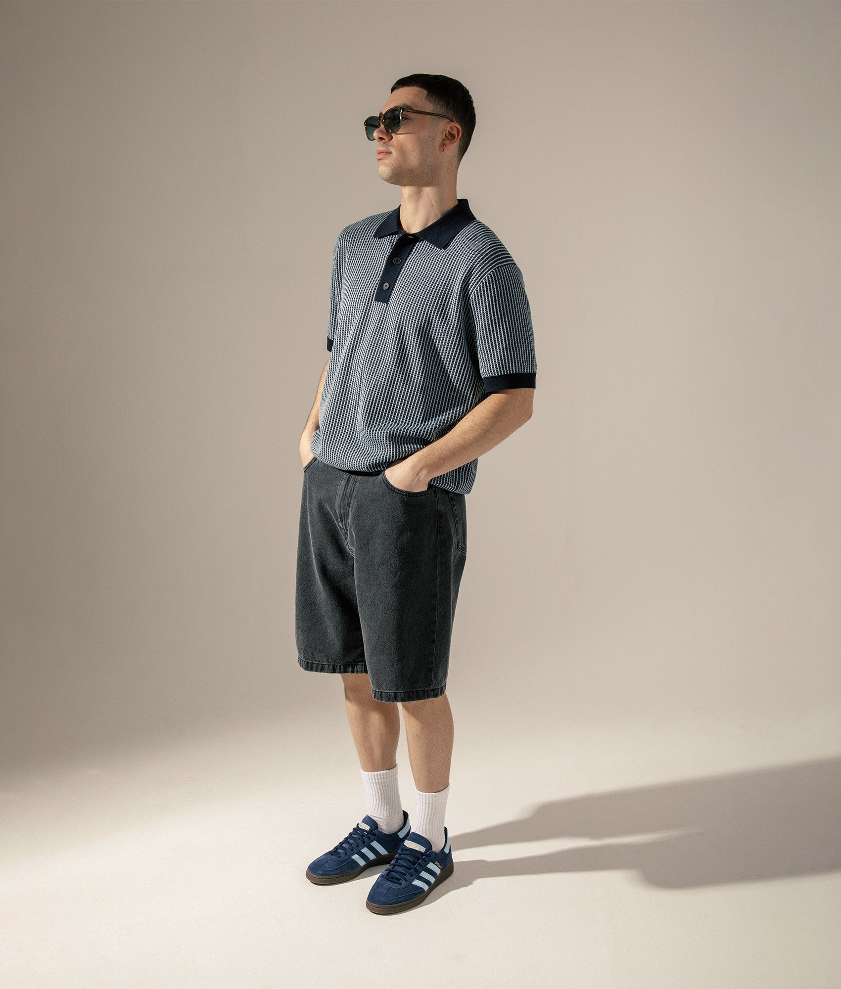Wax London Turin Polo Shirt in Navy at EQVVS. Campaign Image.