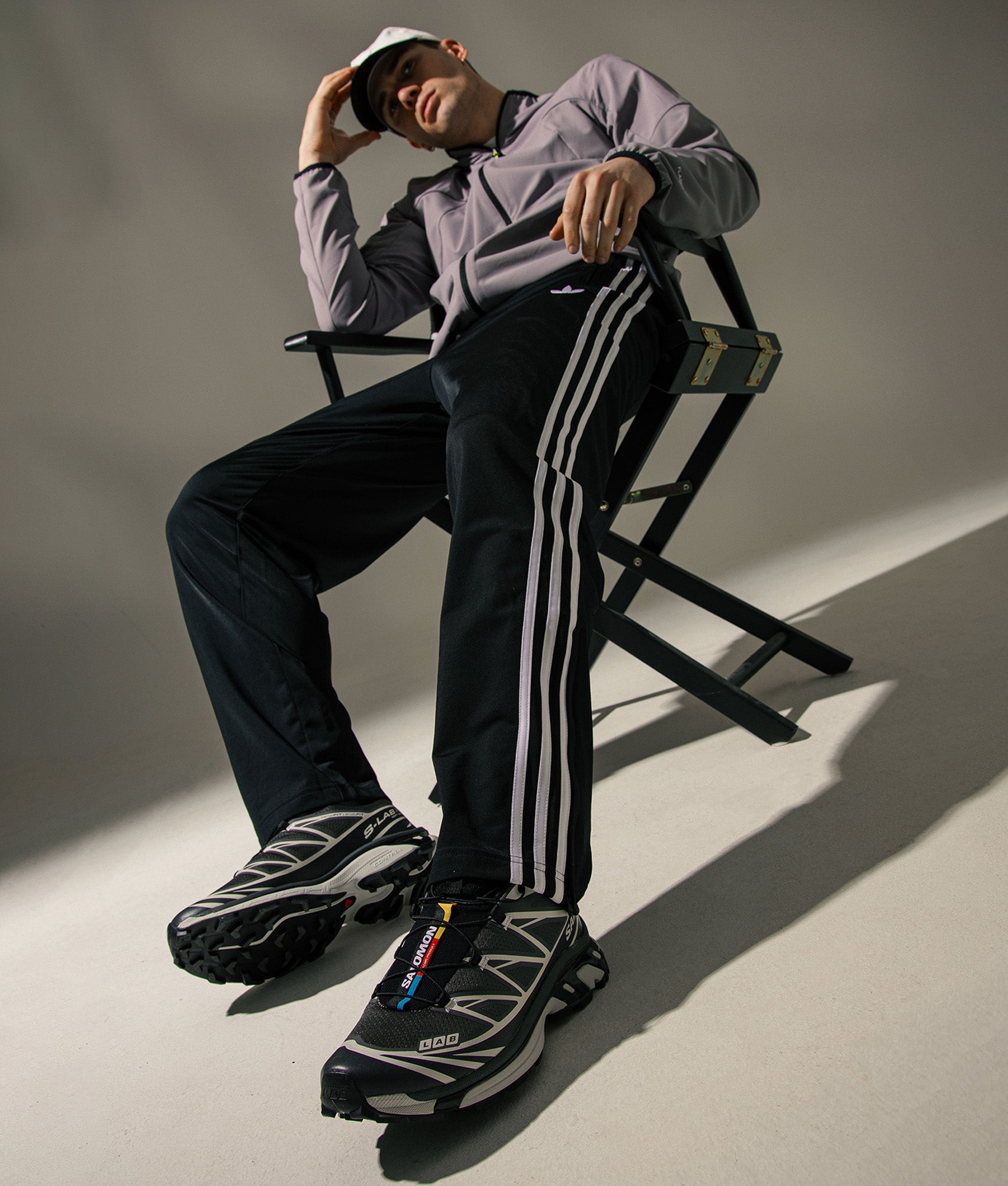 SALOMON XT-6 in Black, Asphalt and Castlerock at EQVVS Menswear.  Campaign shot.
