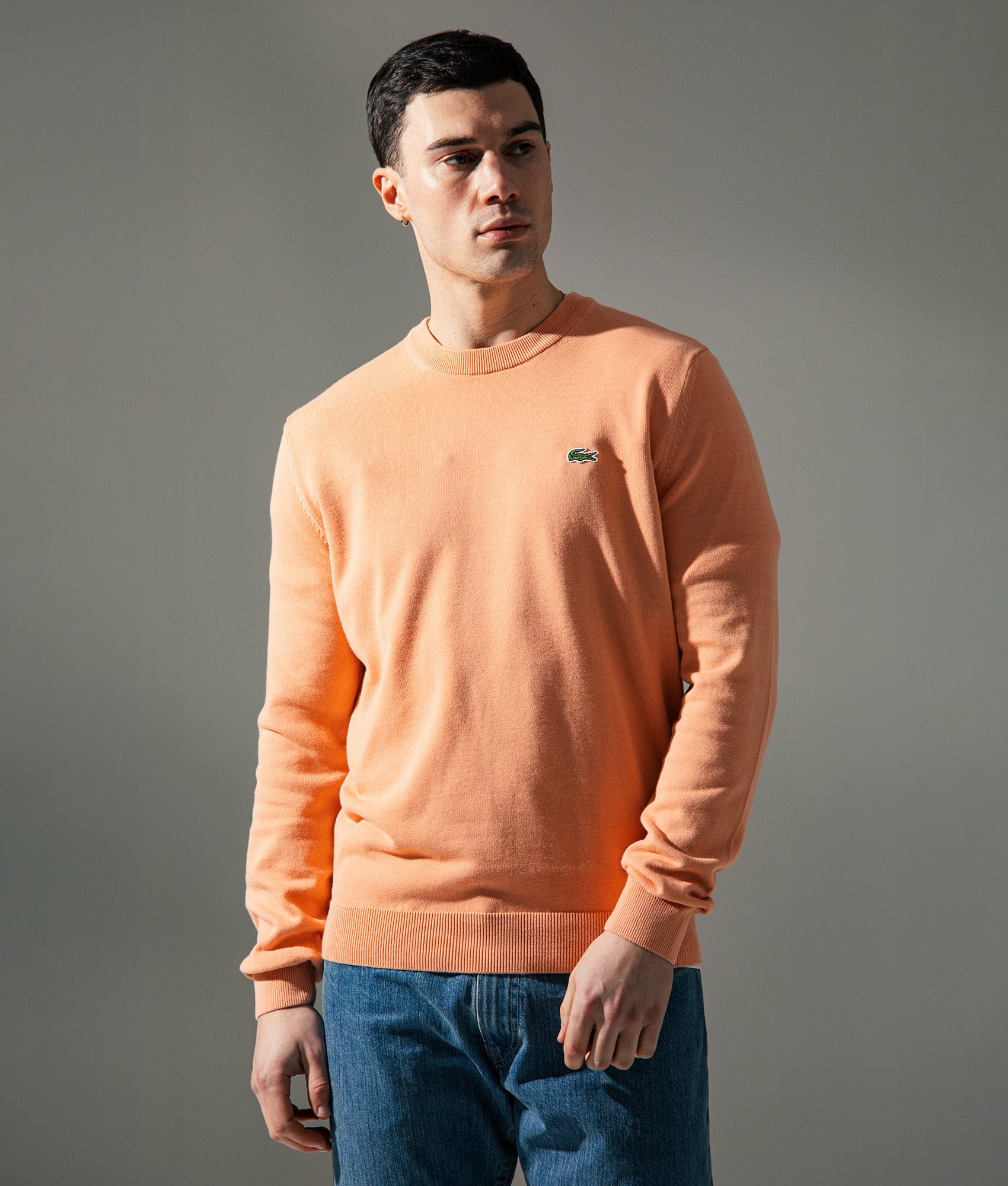 Lacoste Croc Logo Knitted Jumper in Miami at EQVVS Menswear. Campaign shot.