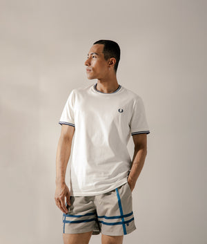 Barbour Twain Swim Shorts in Washed Stone at EQVVS. Campaign Shot.