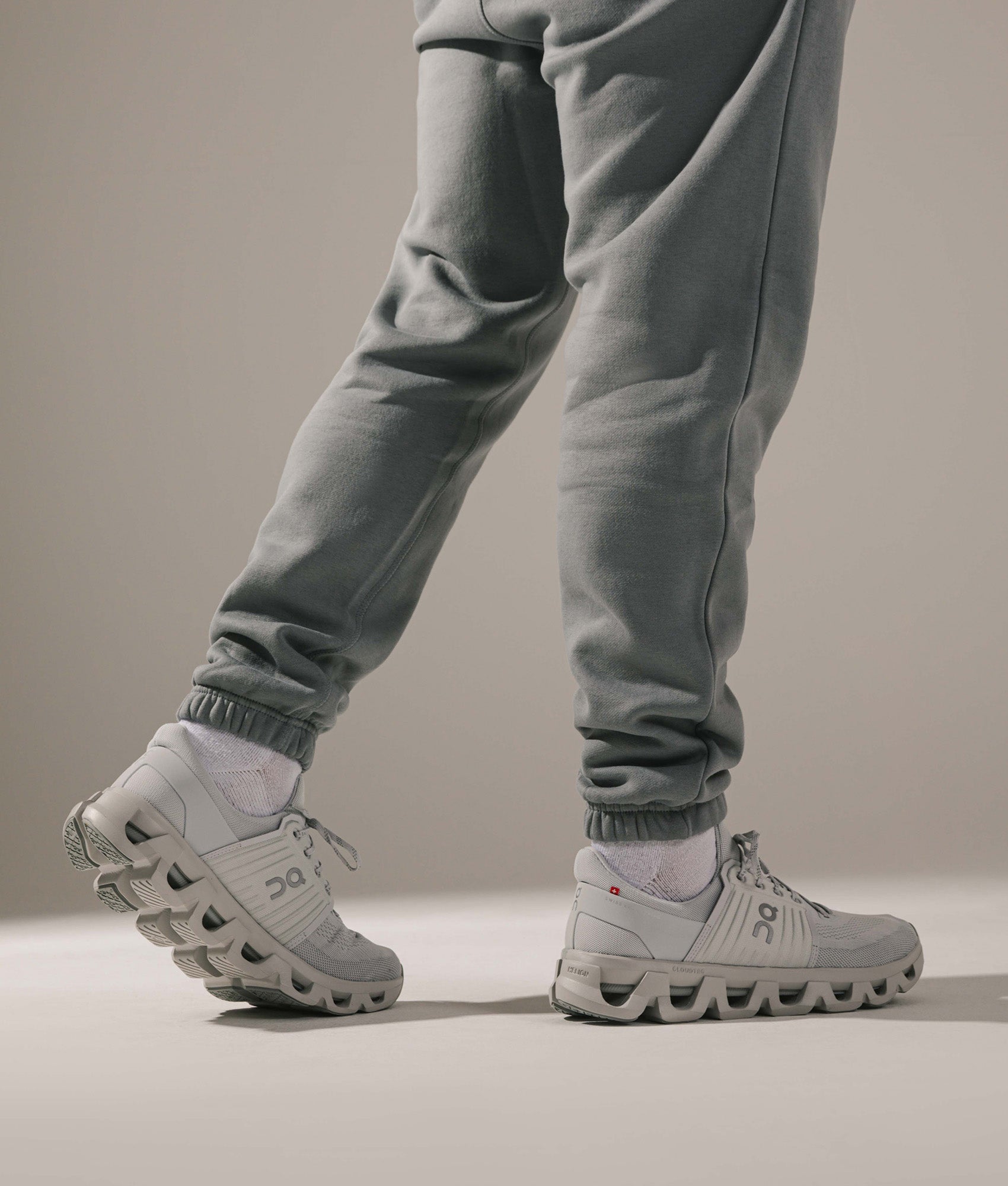 On Cloudswift 4 AD Sneakers in Wolf at EQVVS Menswear. On foot shot.