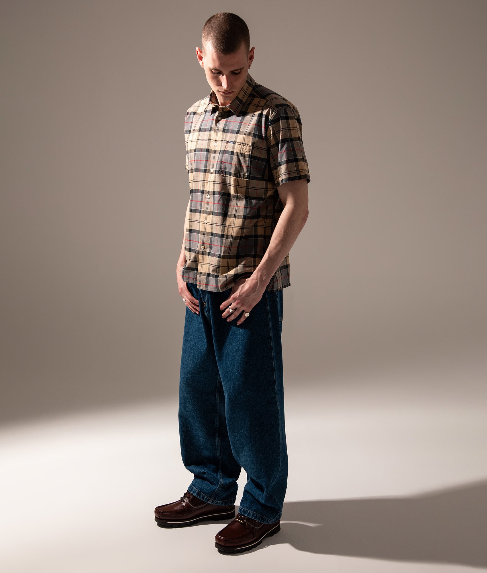 Barbour Gordon Short Sleeve Shirt in Dress Tartan at EQVVS Menswear. Campaign shot.