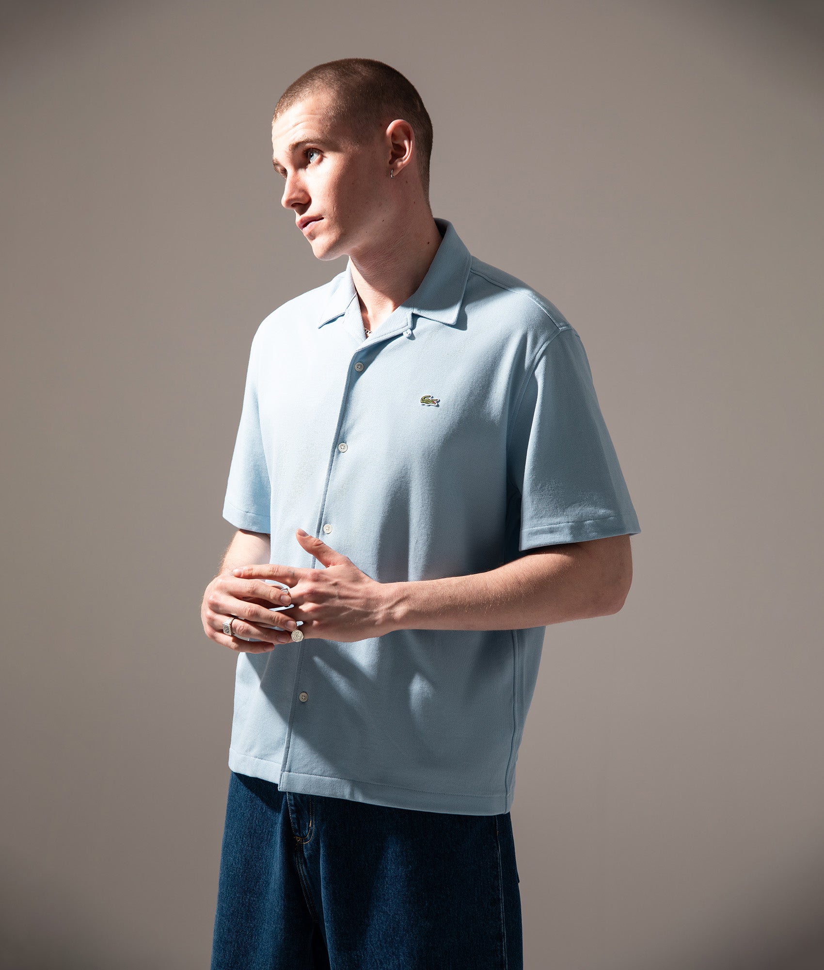 Lacoste Short Sleeve Casual Shirt in Chambray at EQVVS Menswear. Campaign shot.