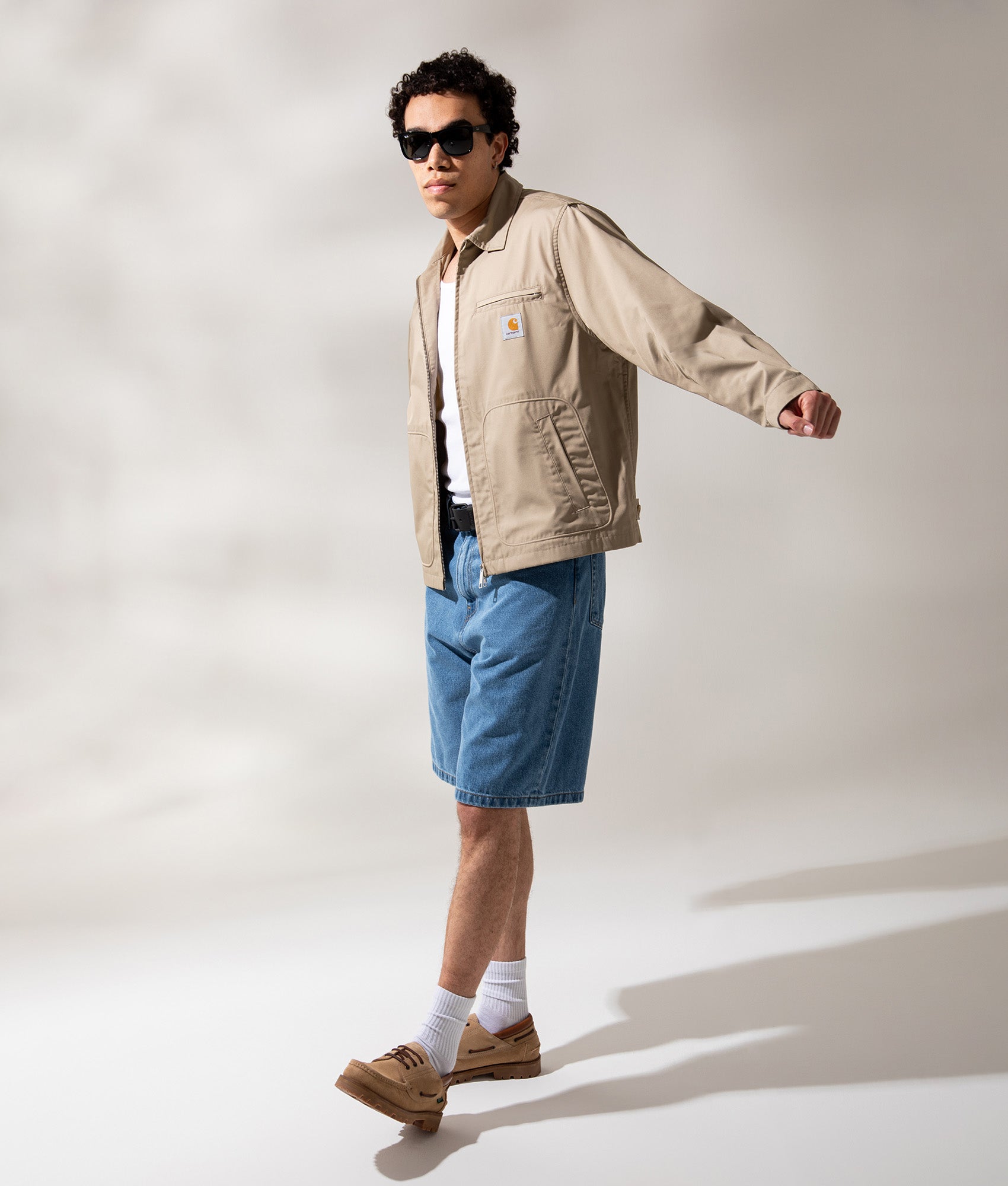 Carhartt WIP Postal Jacket in Iroko at EQVVS Menswear. Campaign shot.