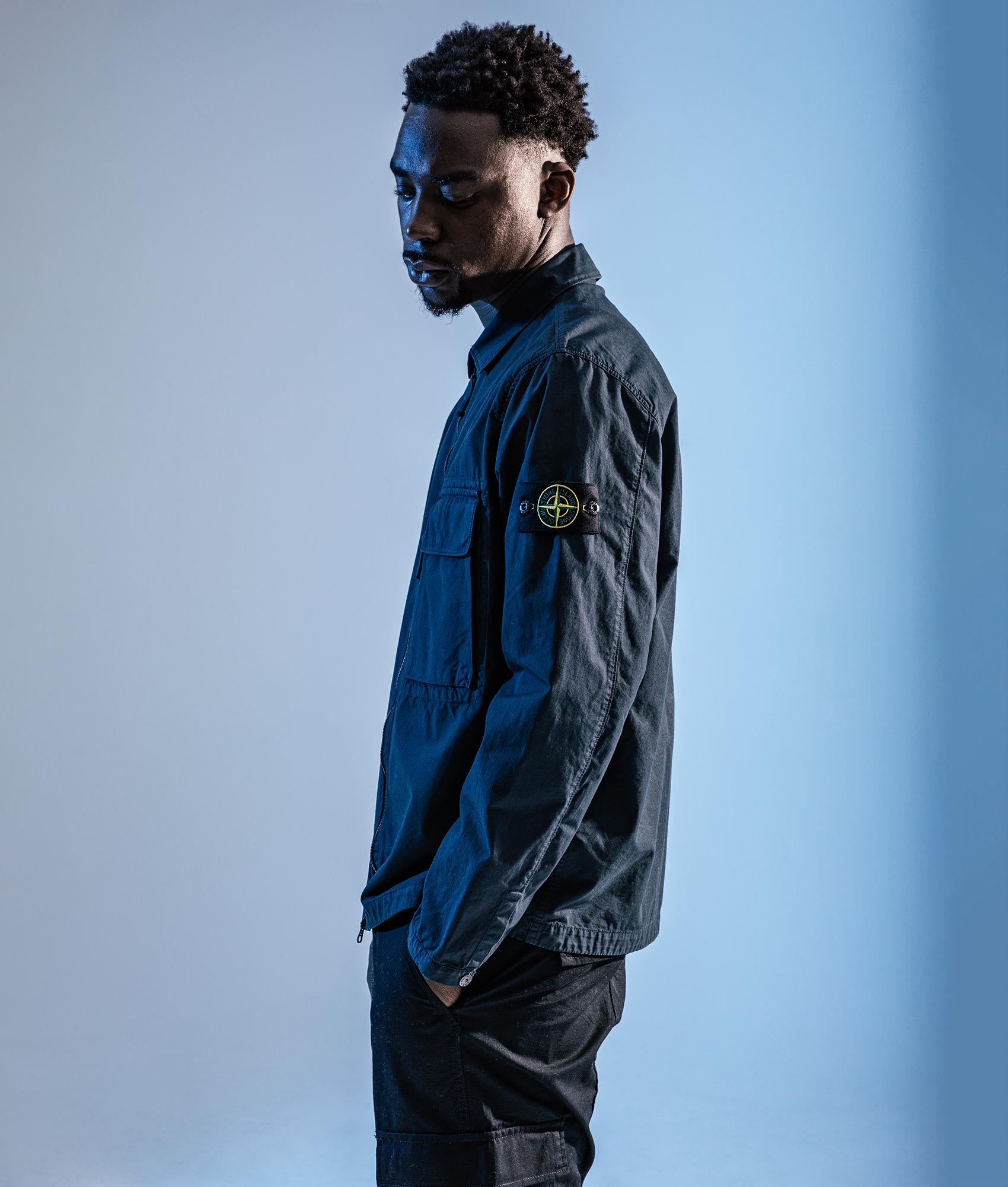 Canvas Weave Overshirt in Navy Blue . 100% Cotton | Stone Island | Shot at EQVVS | Campaign shot 