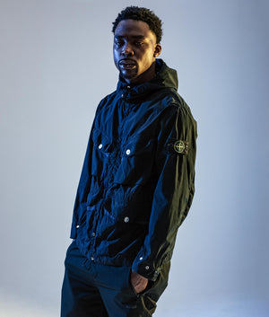 Light Compact Field Parka by Stone Island in Navy Blue. Shot by EQVVS. Campaign Shot.