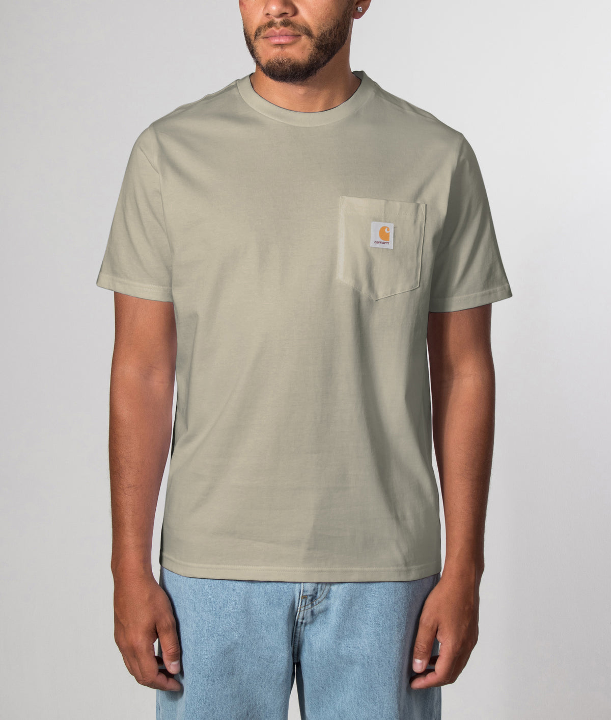 Carhartt WIP Pocket T-Shirt in Shady Green at EQVVS Menswear. Front model shot.