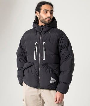 Gramicci x and wander Black Down Jacket- shot at EQVVS. Model shot. 