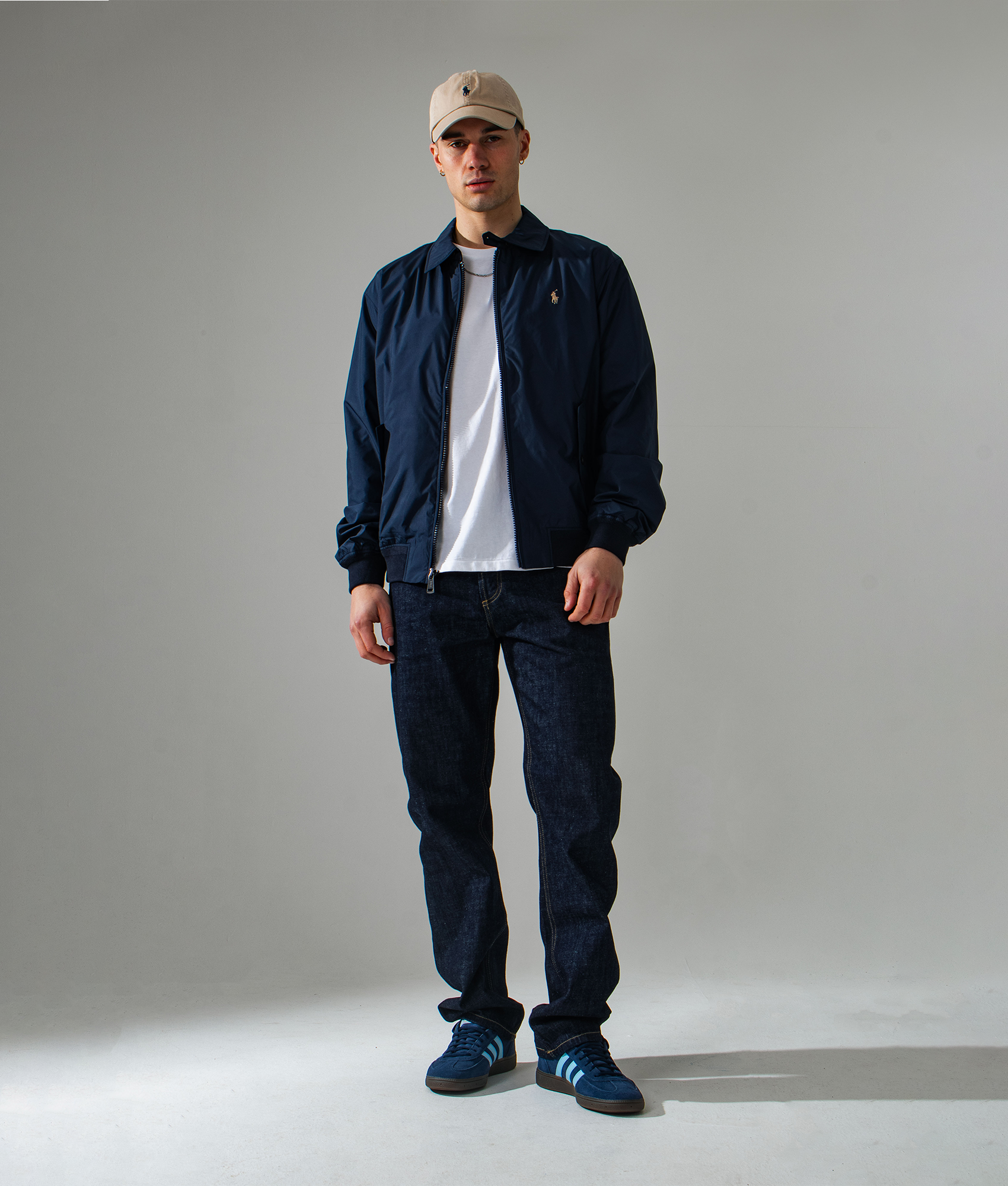 Polo Ralph Lauren Packable Windbreaker Jacket in Navy. campaign image at EQVVS full.