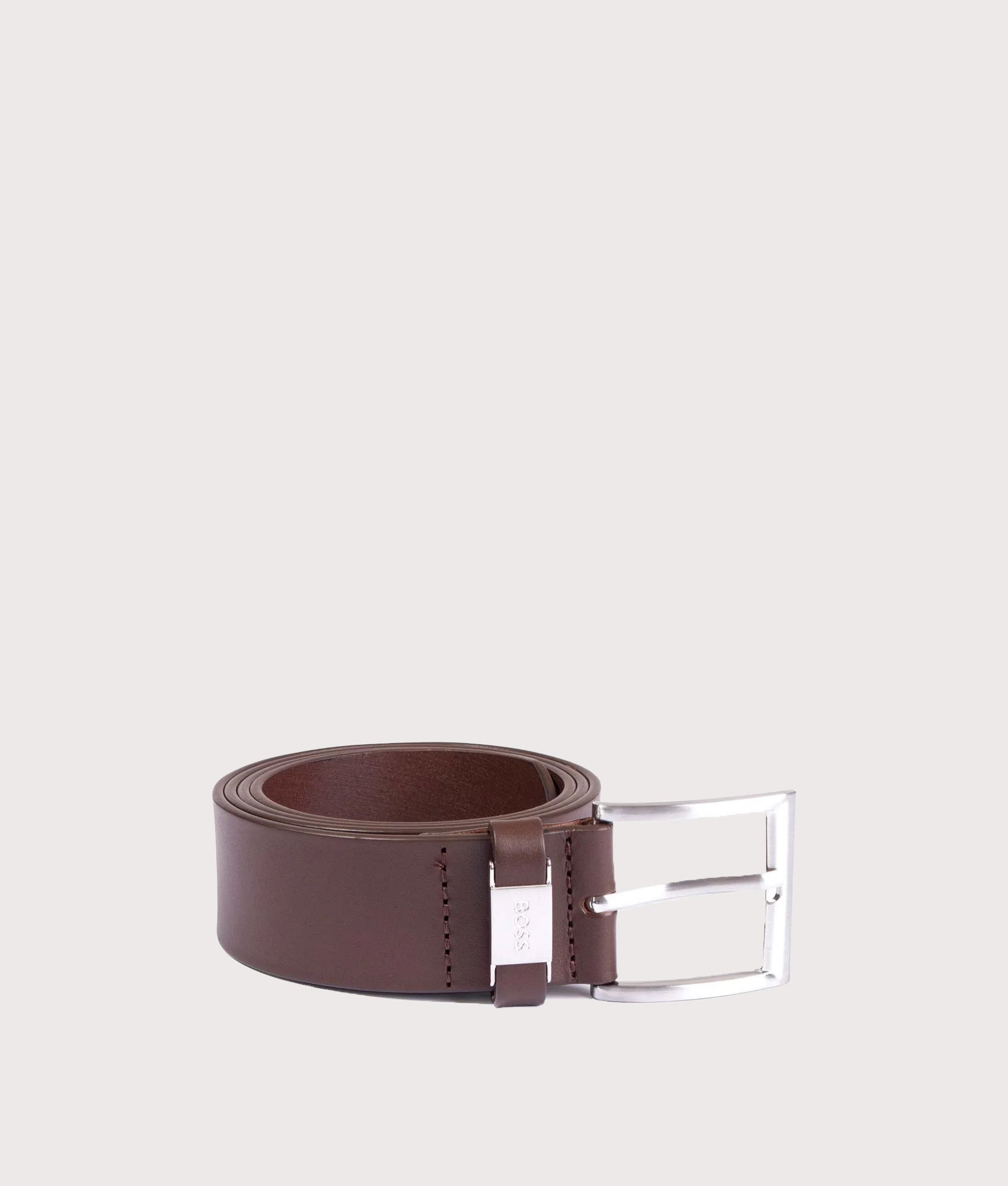 BOSS Italian Leather Connio Belt in Dark Brown at EQVVS Menswear. Rolled up shot.