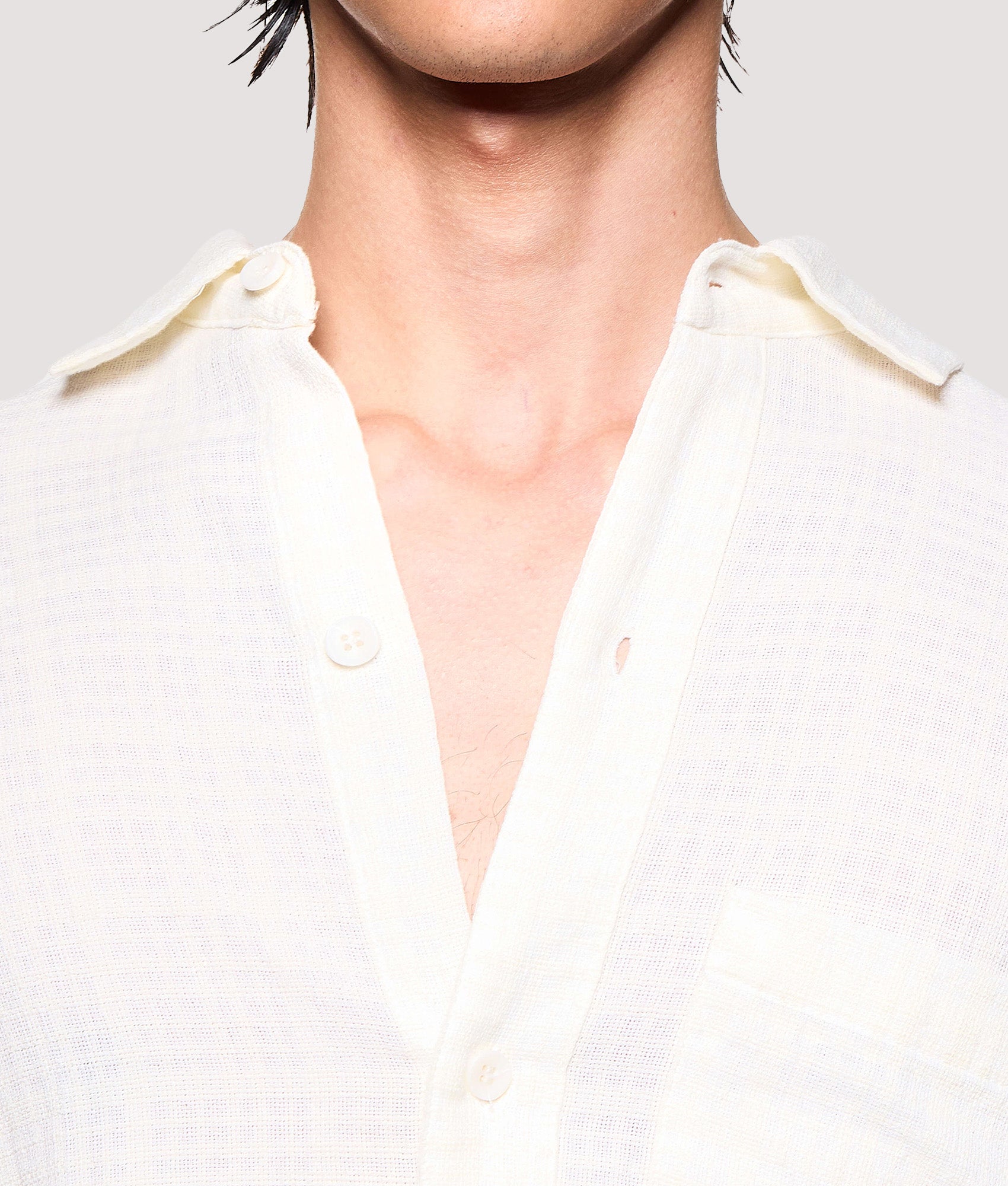 MKI MIYUKI ZOKU Box Fit Loose Weave Check Dress Shirt in Bone at EQVVS Menswear. Detail shot.