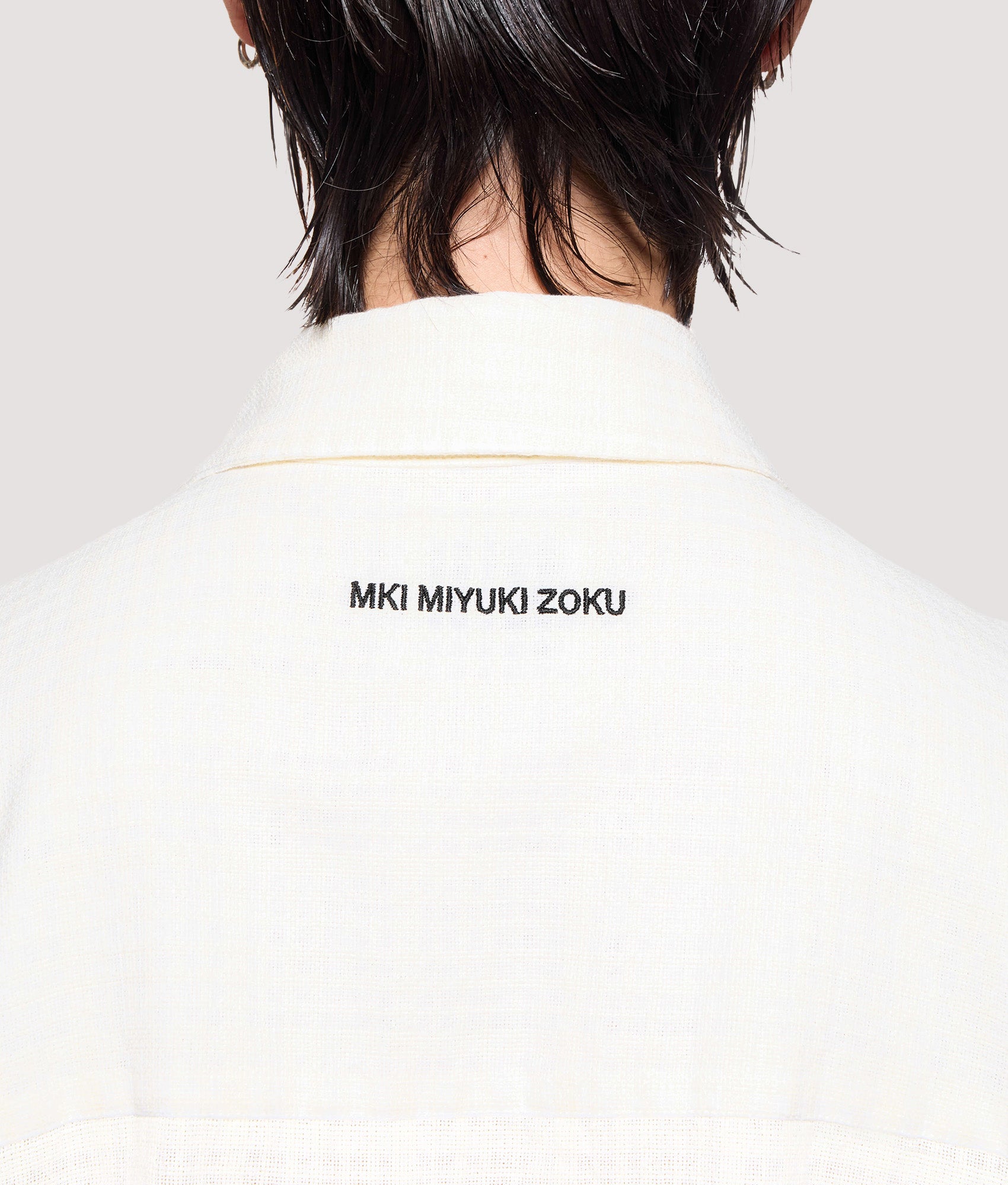 MKI MIYUKI ZOKU Box Fit Loose Weave Check Dress Shirt in Bone at EQVVS Menswear. Back detail shot.
