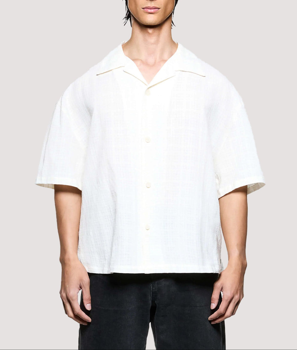 MKI MIYUKI ZOKU Box Fit Loose Weave Check Short Sleeve Vacation Shirt in Bone at EQVVS Menswear. Model front shot.