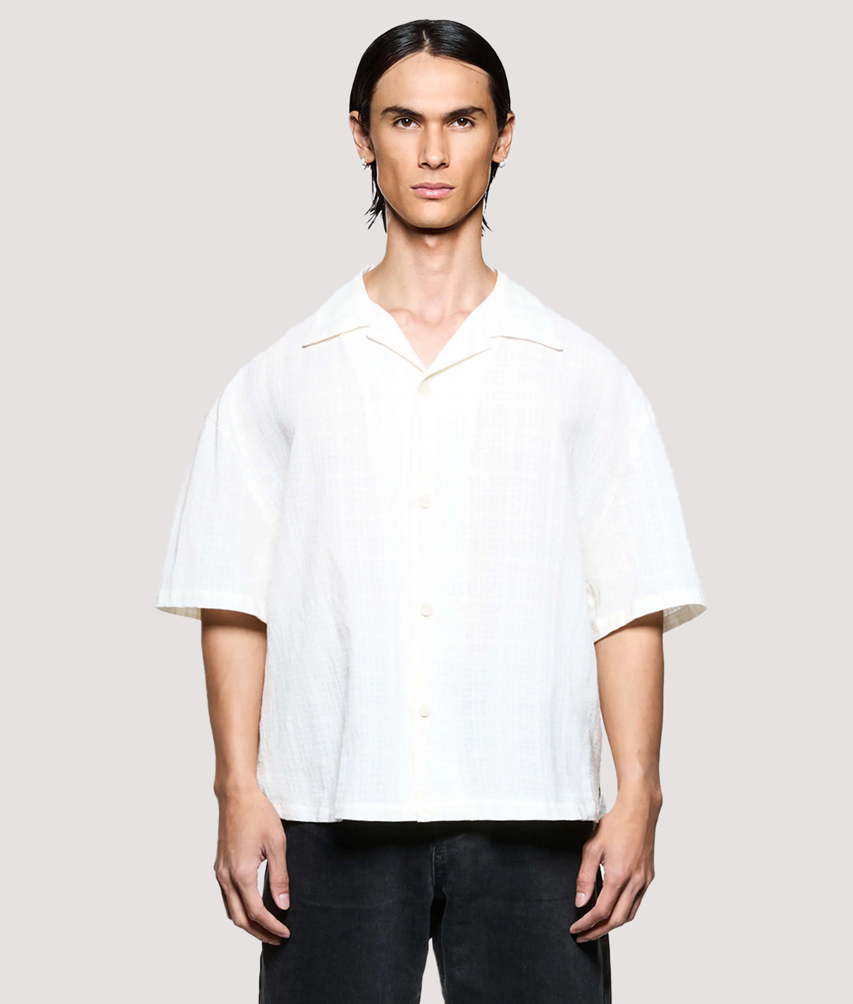 MKI MIYUKI ZOKU Box Fit Loose Weave Check Short Sleeve Vacation Shirt in Bone at EQVVS Menswear. Model front shot.